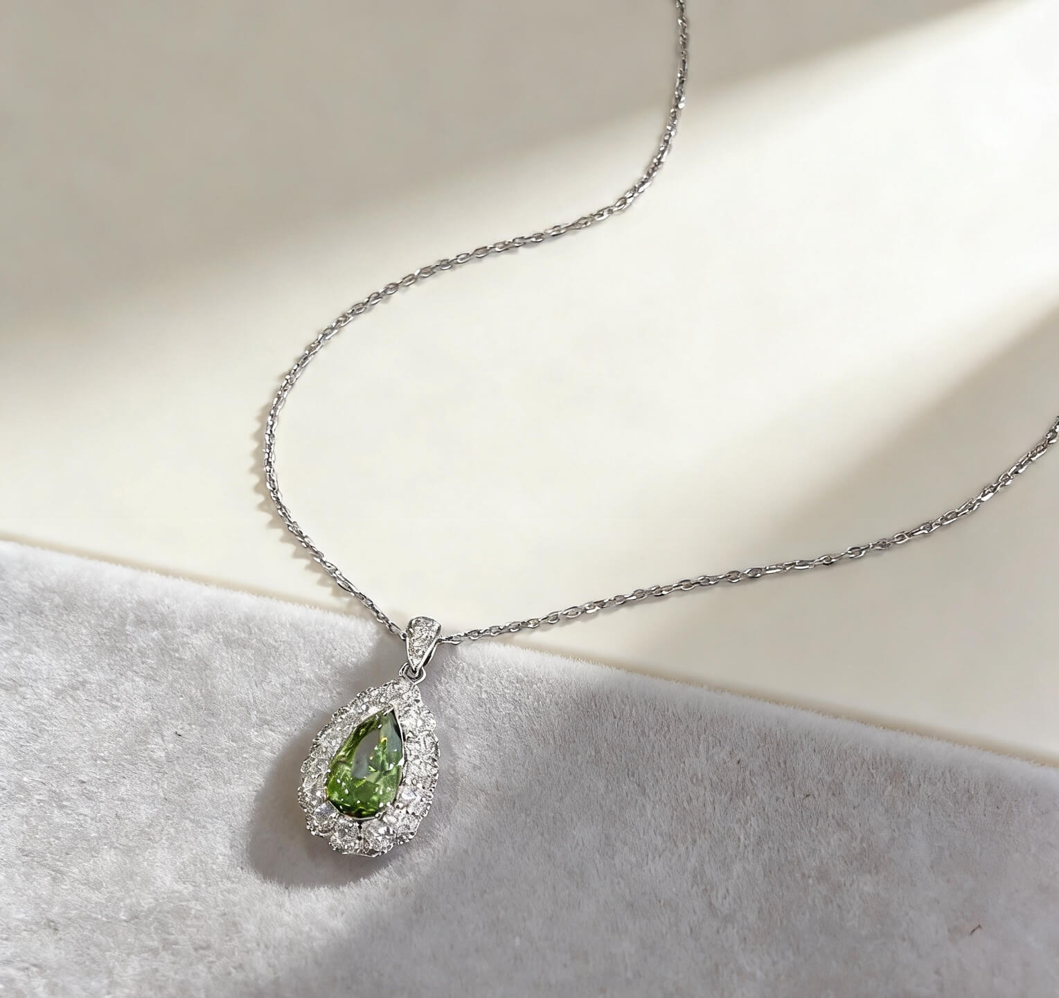 Halo setting pear cut lab grown green diamond pendant necklace