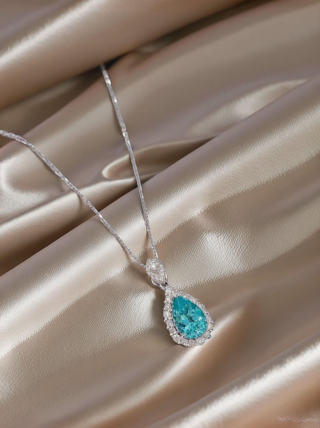 Halo setting pear cut lab grown paraiba pendant necklace