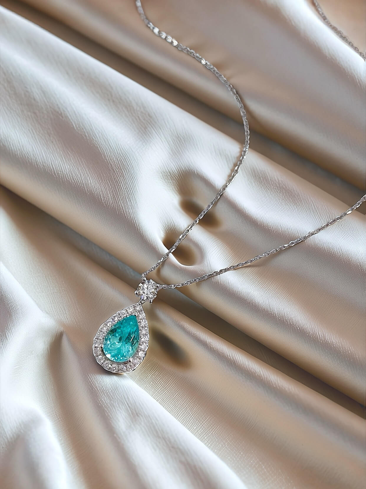 Halo setting pear cut lab grown paraiba pendant necklace