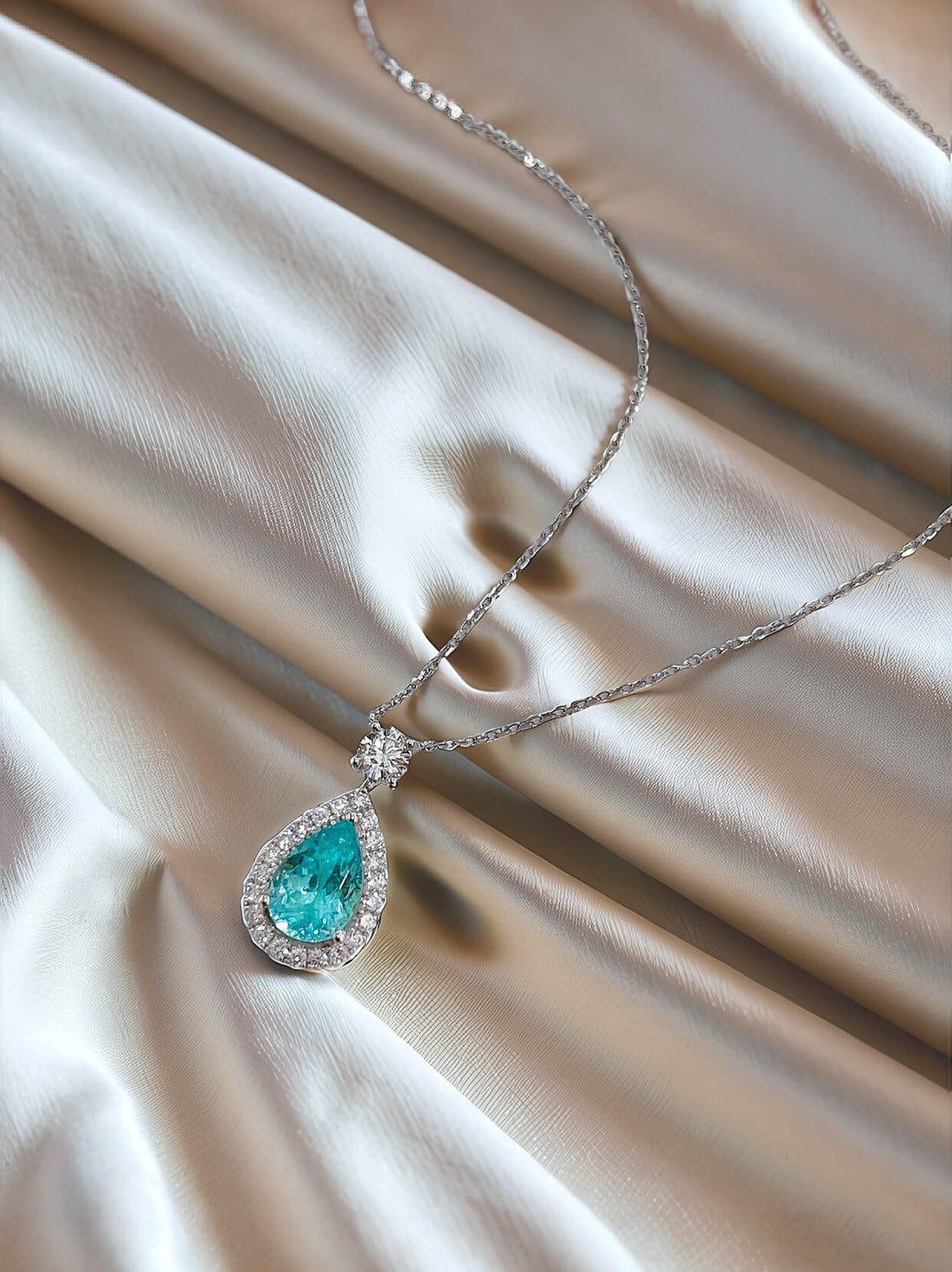 Halo setting pear cut lab grown paraiba pendant necklace
