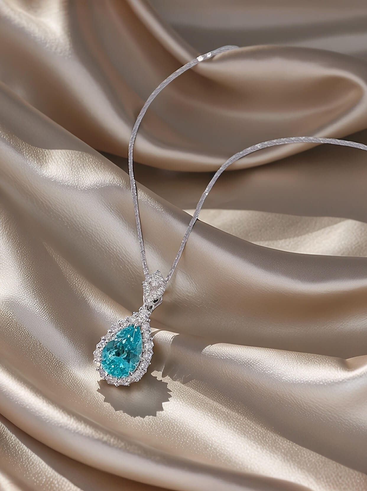 Halo setting pear cut lab grown paraiba pendant necklace
