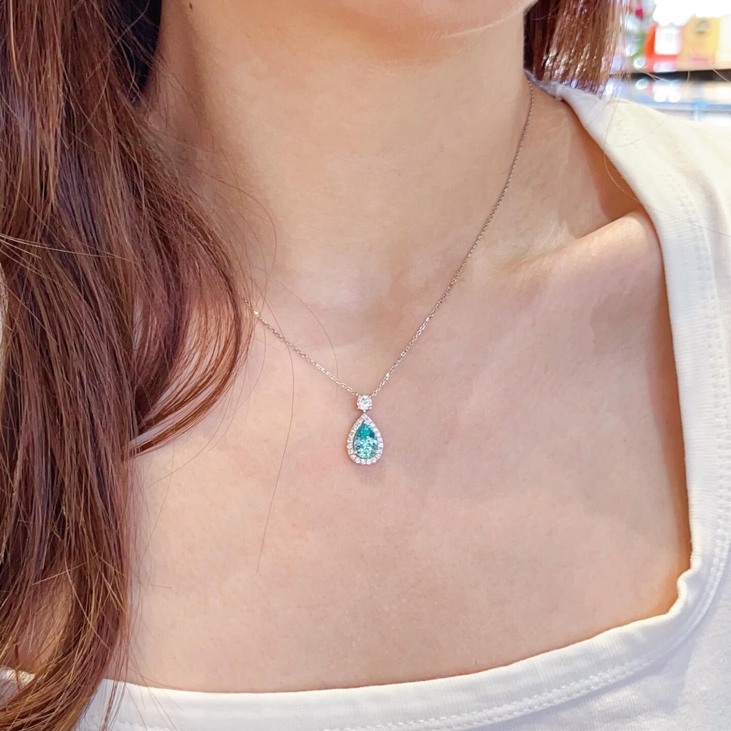 Halo setting pear cut lab grown paraiba pendant necklace