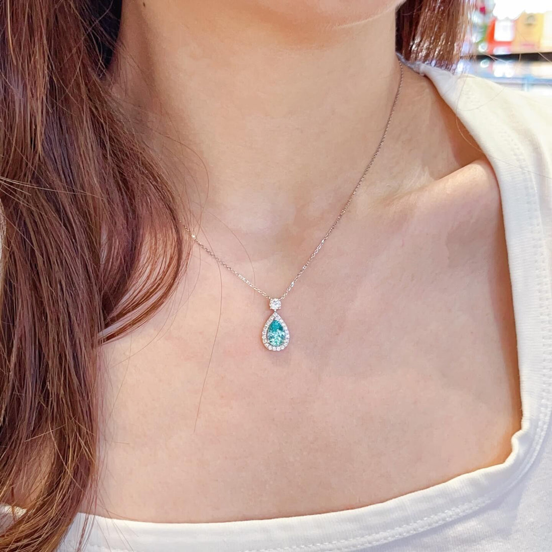 Halo setting pear cut lab grown paraiba pendant necklace
