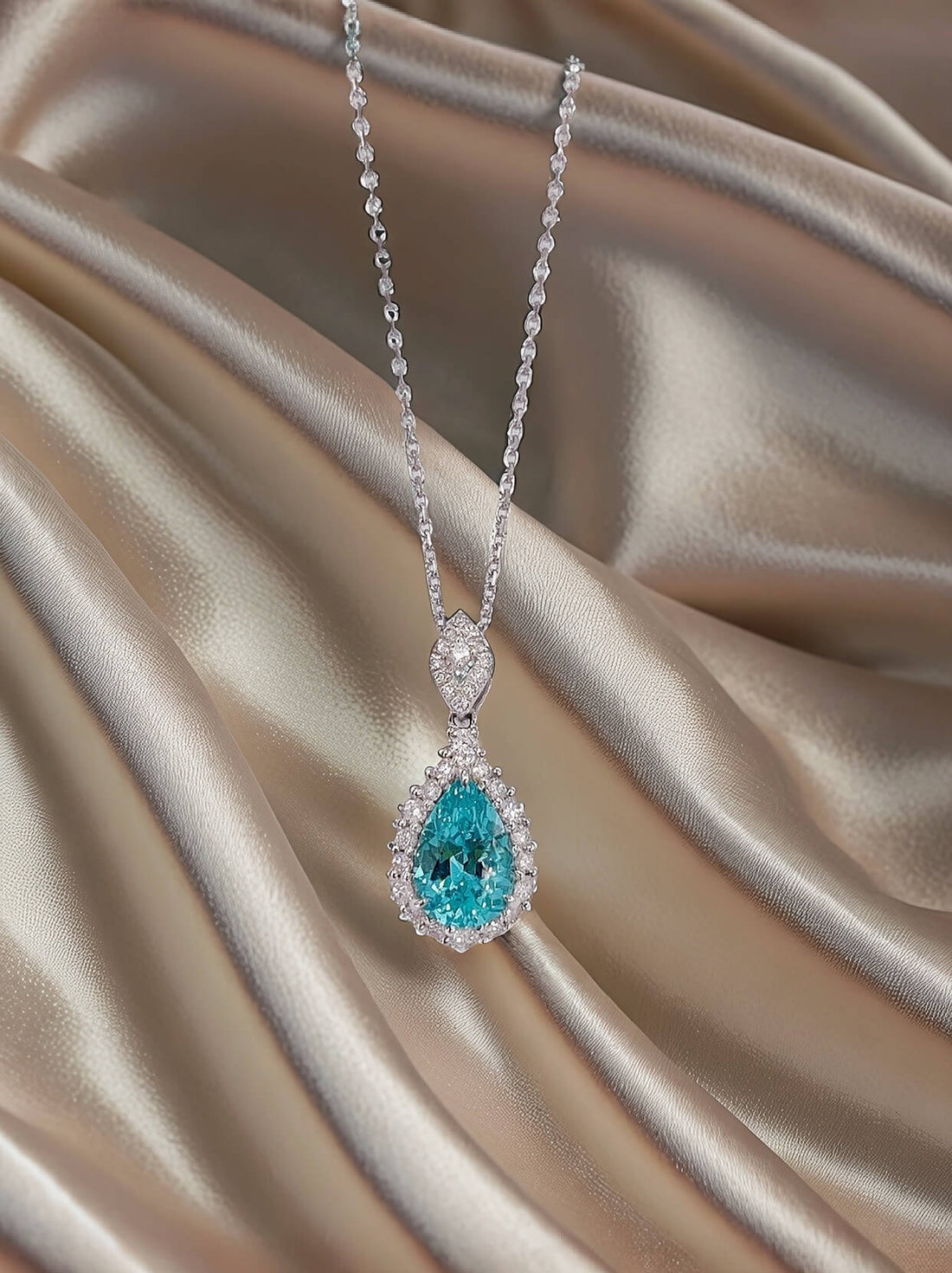 Halo setting pear cut lab grown paraiba pendant necklace