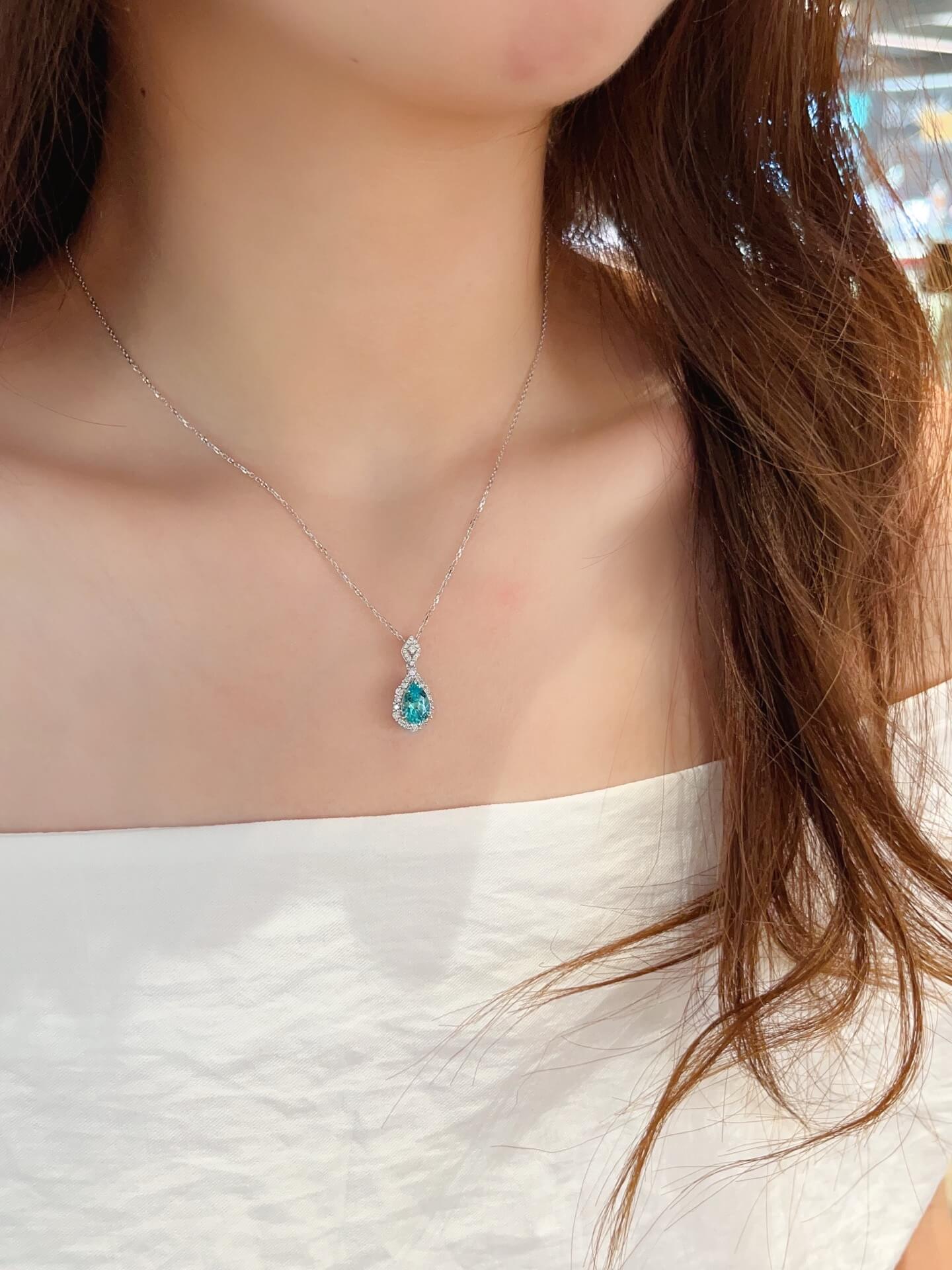 Halo setting pear cut lab grown paraiba pendant necklace