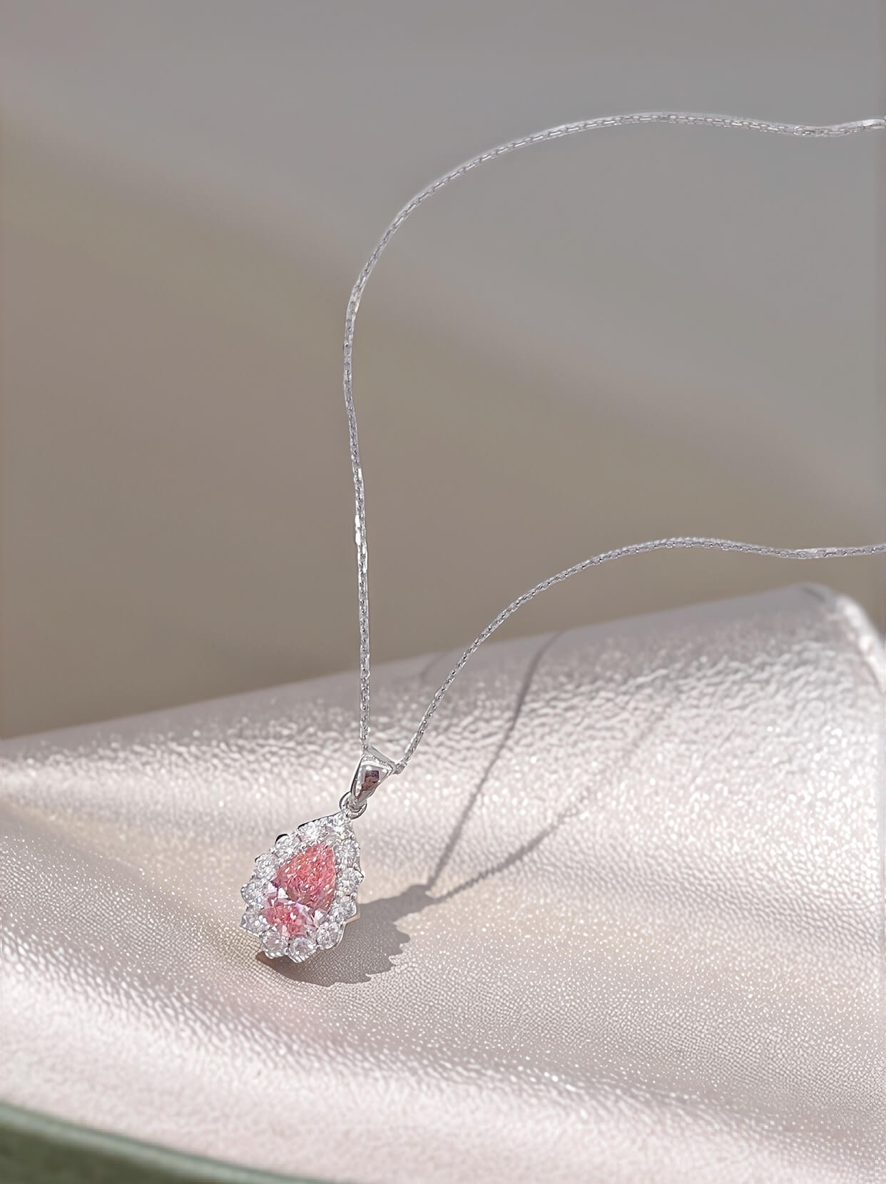 Halo setting pear cut lab grown pink diamond pendant necklace