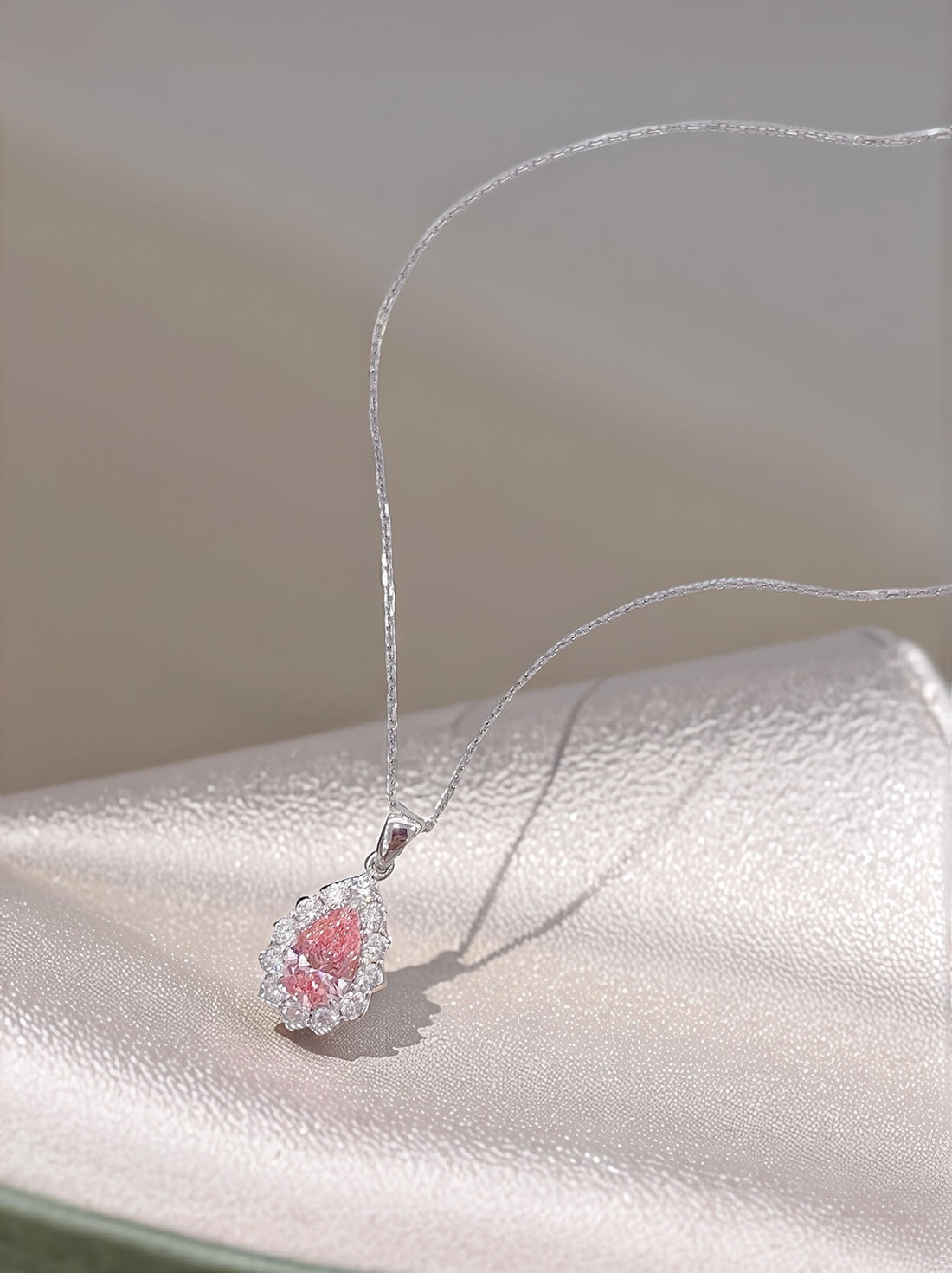 Halo setting pear cut lab grown pink diamond pendant necklace