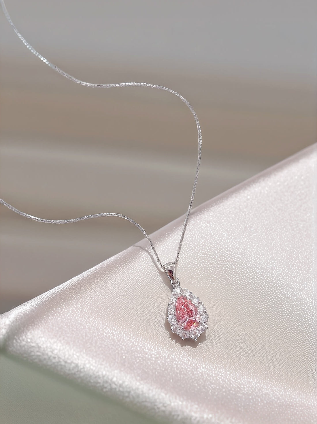 Halo setting pear cut lab grown pink diamond pendant necklace