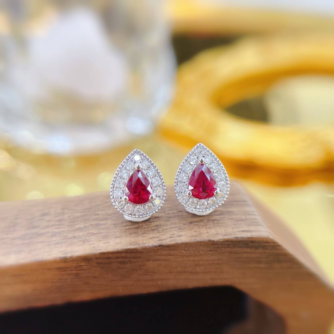 Halo setting pear cut lab grown ruby earrings stud