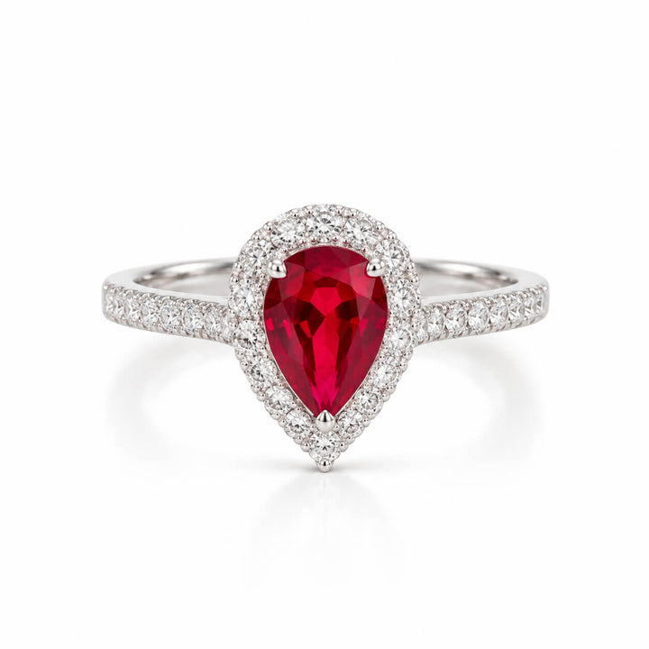 Halo setting pear cut lab grown ruby engagement ring