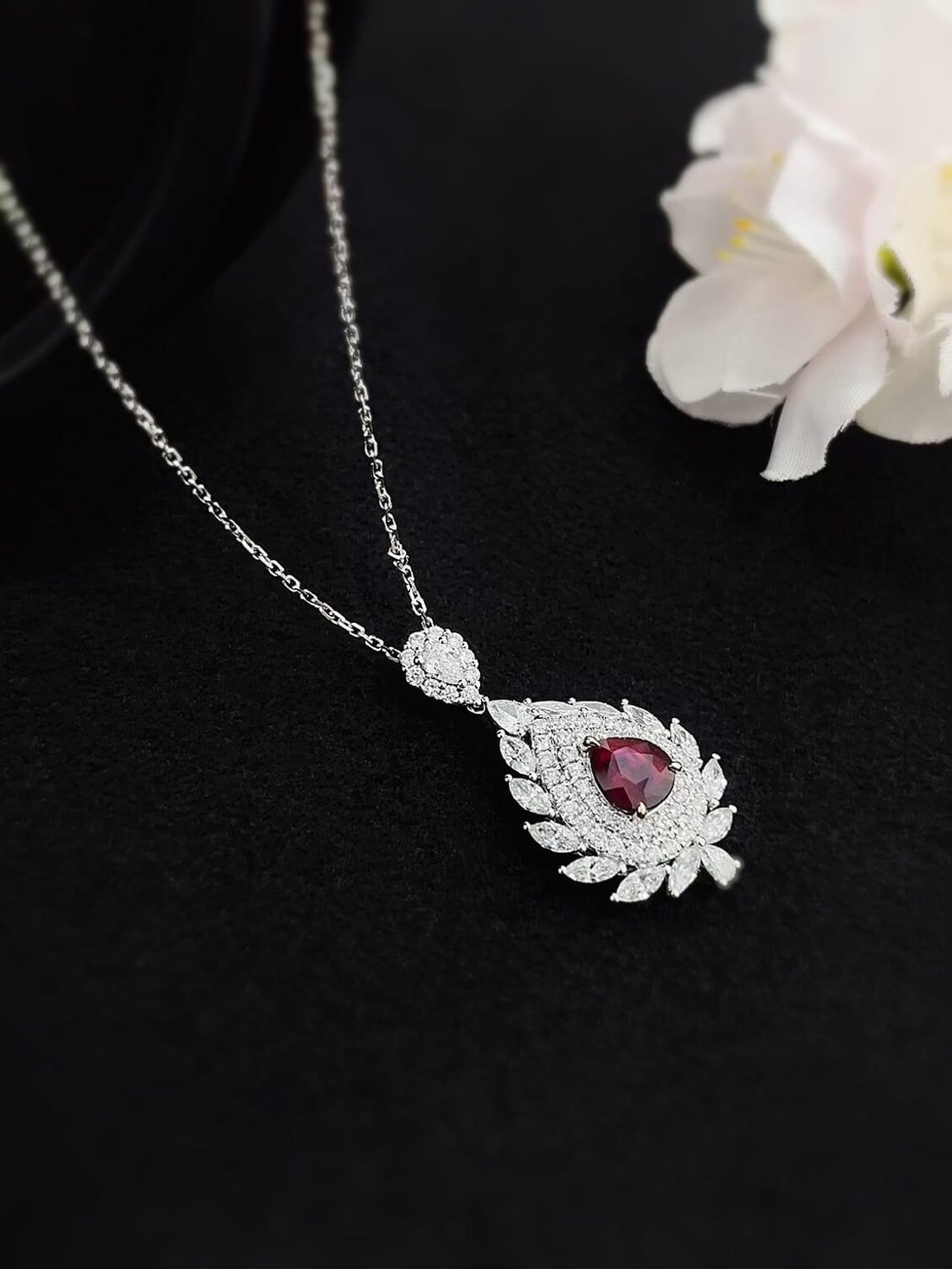 Halo setting pear cut lab grown ruby pendant necklace