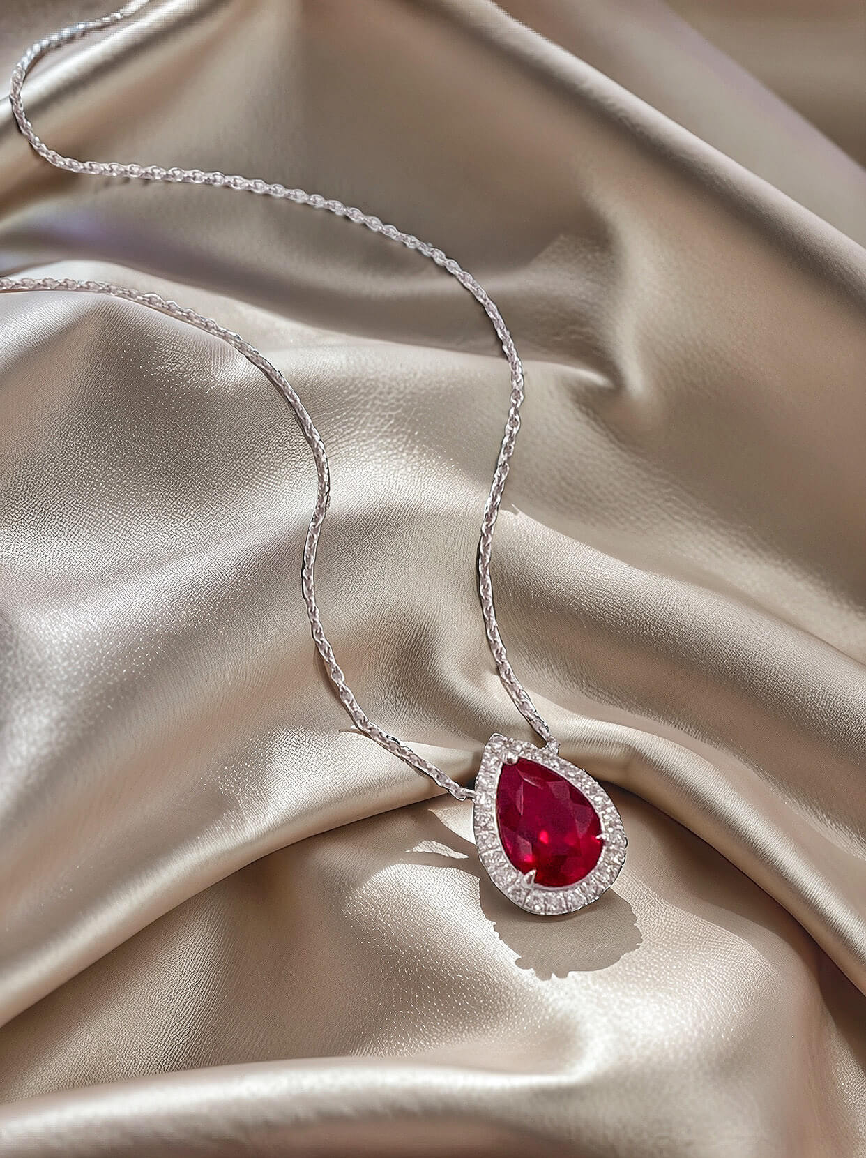 Halo setting pear cut lab grown ruby pendant necklace