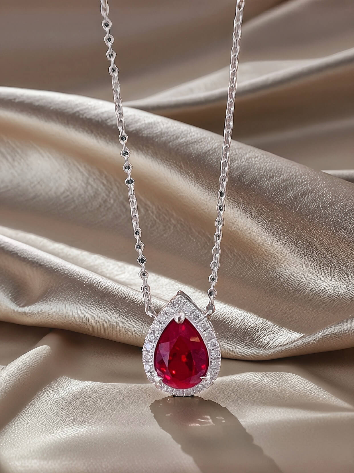Halo setting pear cut lab grown ruby pendant necklace