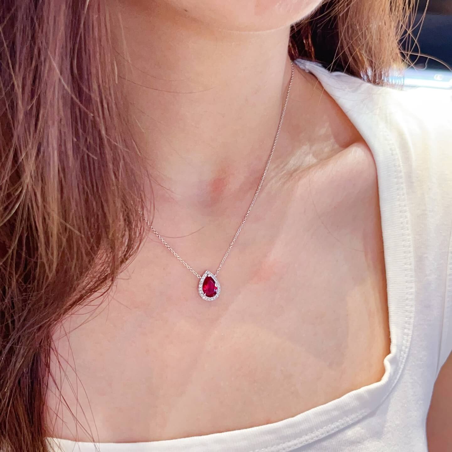 Halo setting pear cut lab grown ruby pendant necklace
