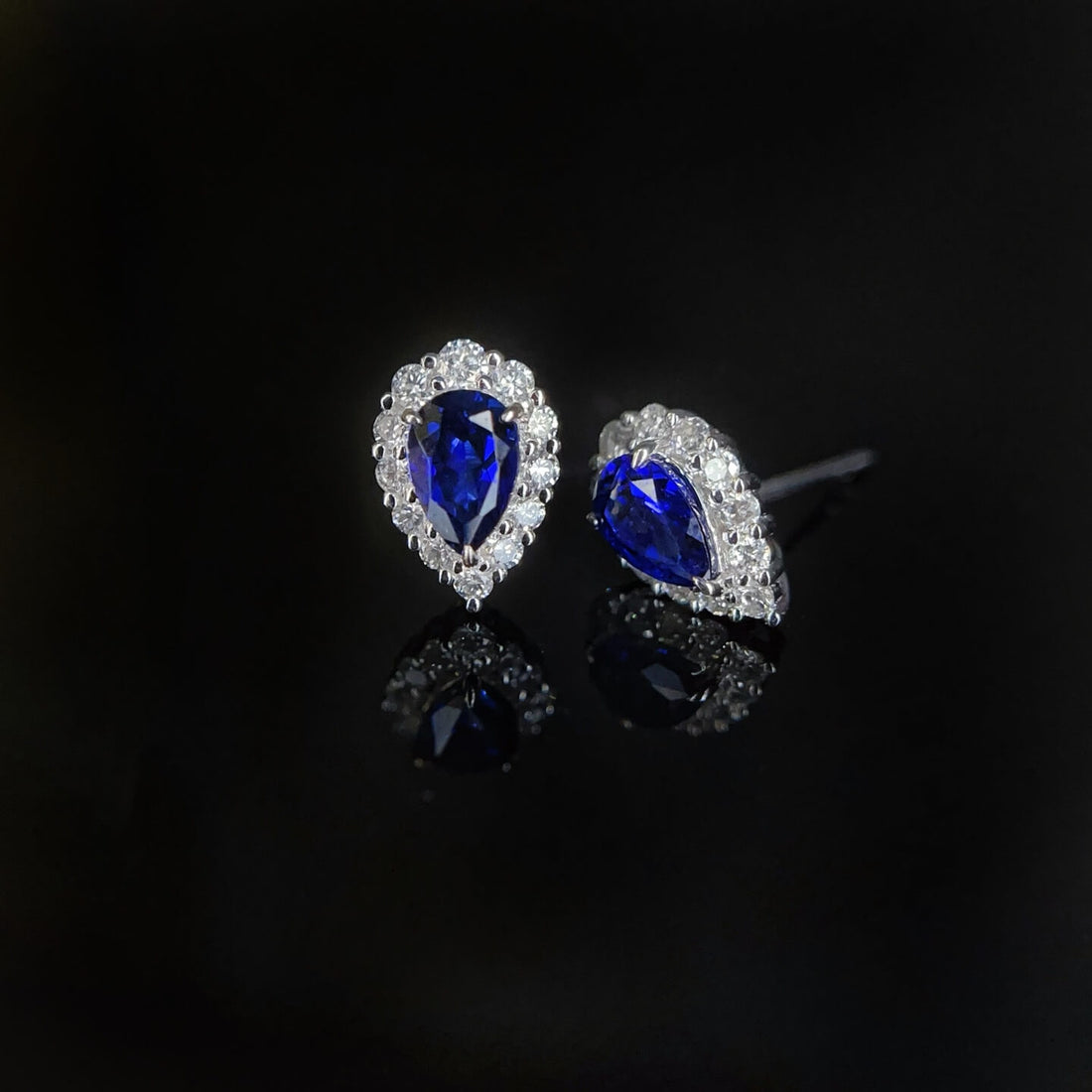 Halo setting pear cut lab grown sapphire earrings stud