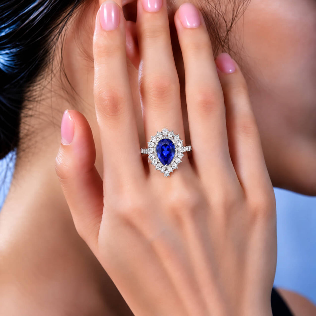 Halo setting pear cut  lab grown sapphire engagement ring