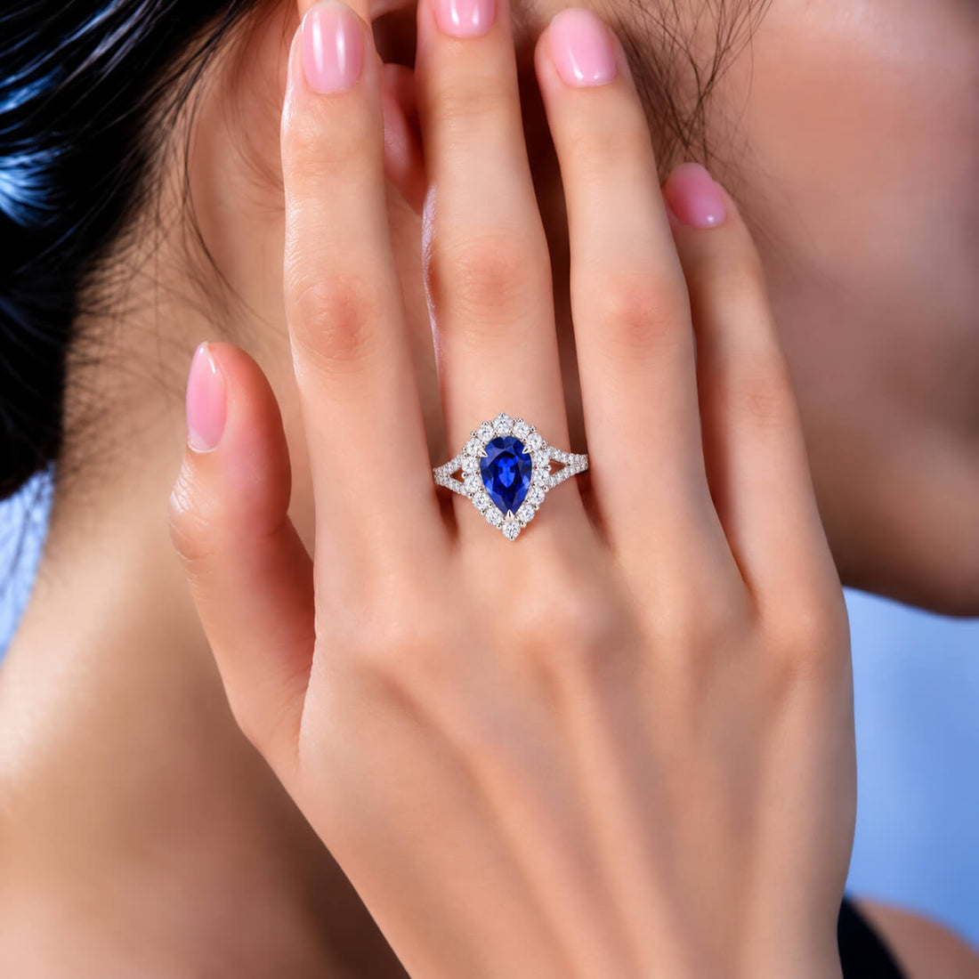Halo setting pear cut  lab grown sapphire engagement ring