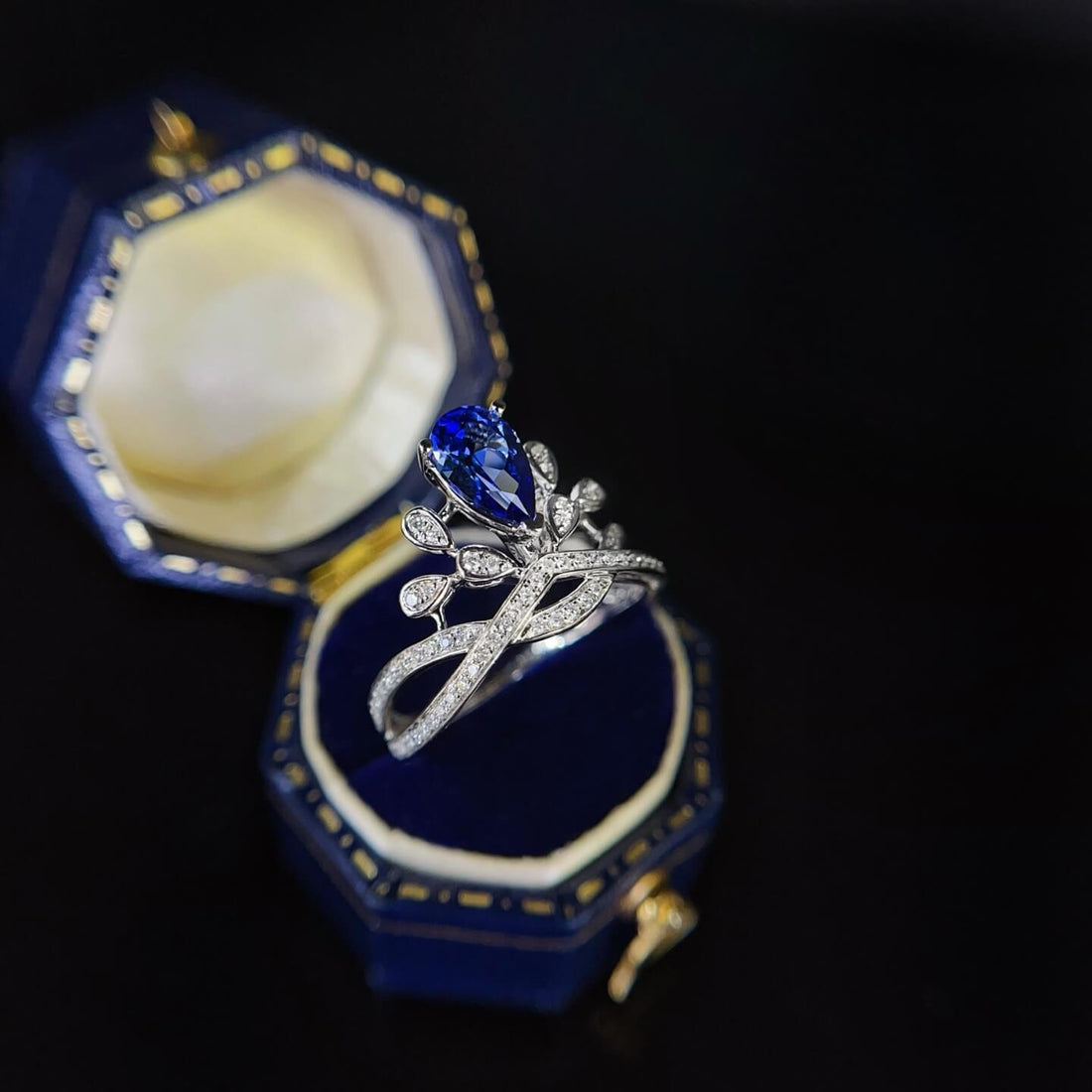 Halo setting pear cut  lab grown sapphire engagement ring