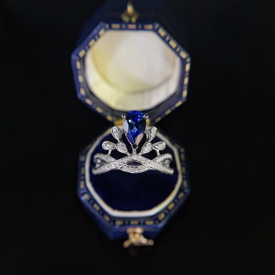 Halo setting pear cut  lab grown sapphire engagement ring