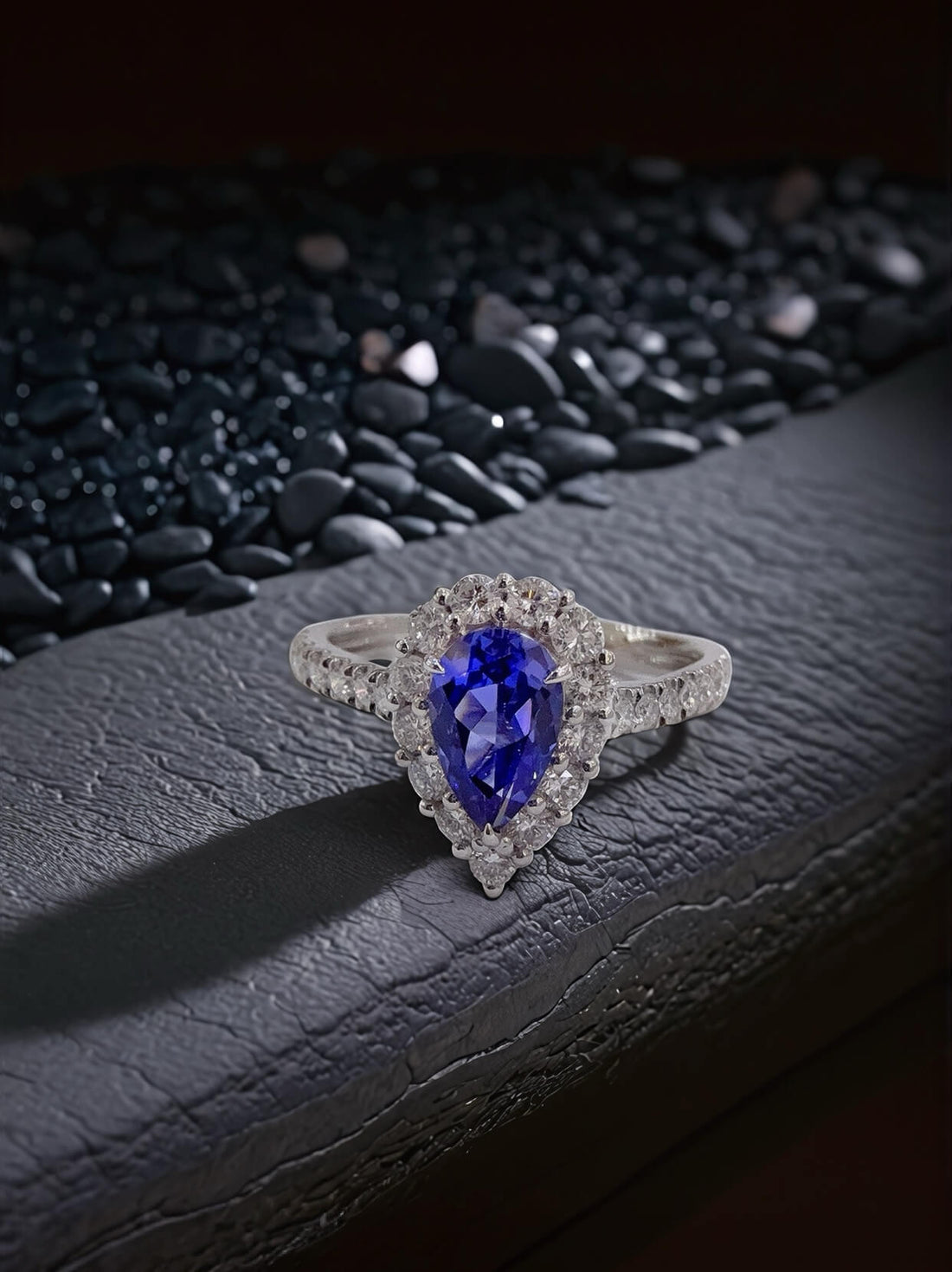 Halo setting pear cut  lab grown sapphire engagement ring