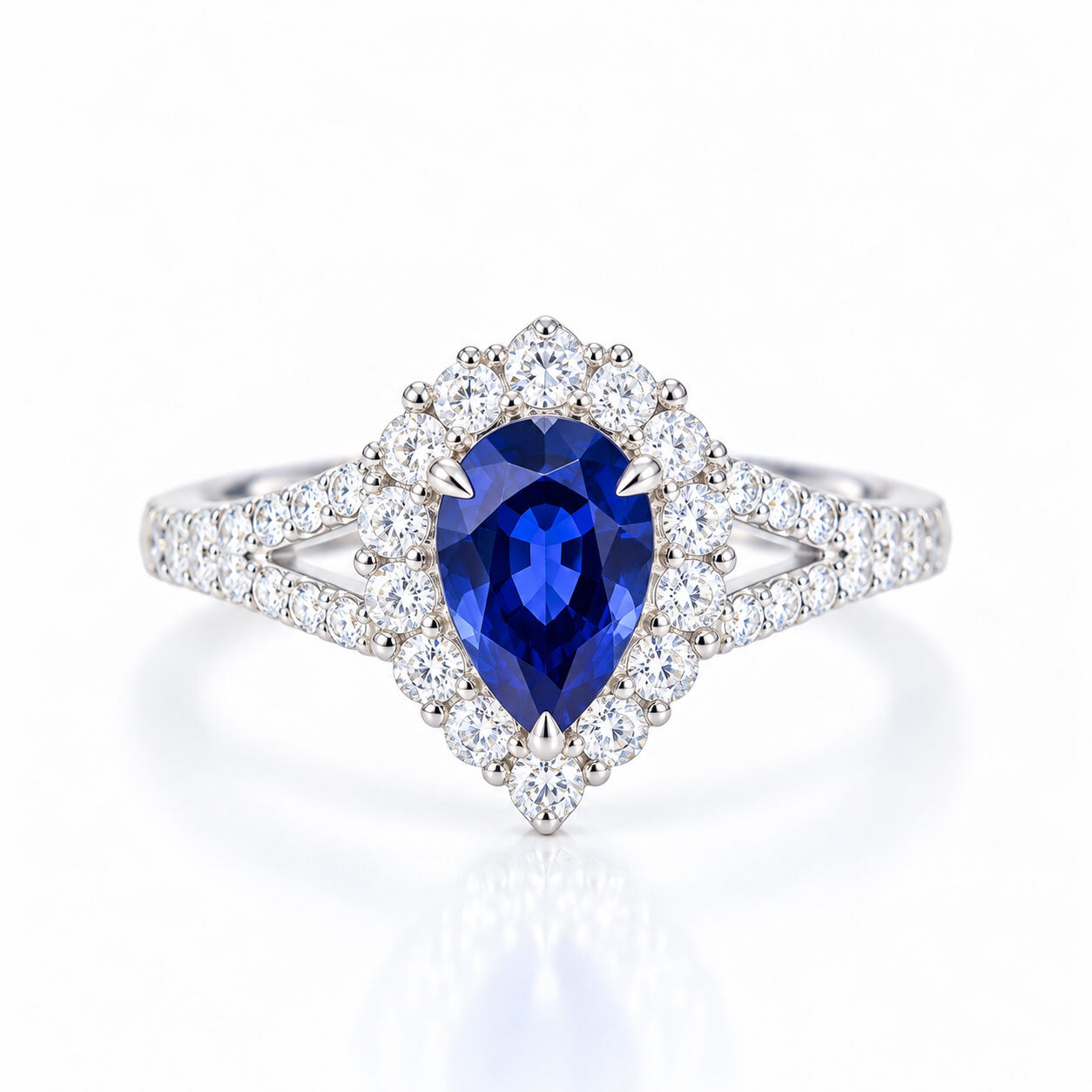 Halo setting pear cut  lab grown sapphire engagement ring