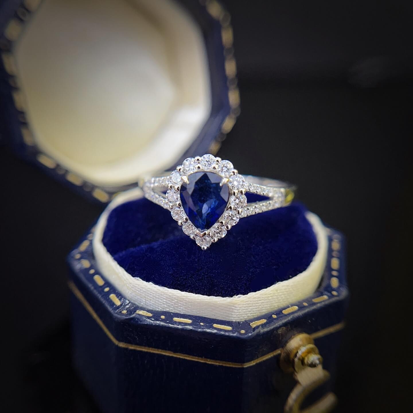 Halo setting pear cut  lab grown sapphire engagement ring