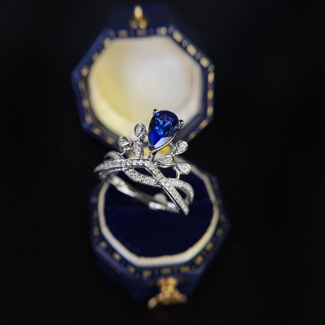Halo setting pear cut  lab grown sapphire engagement ring