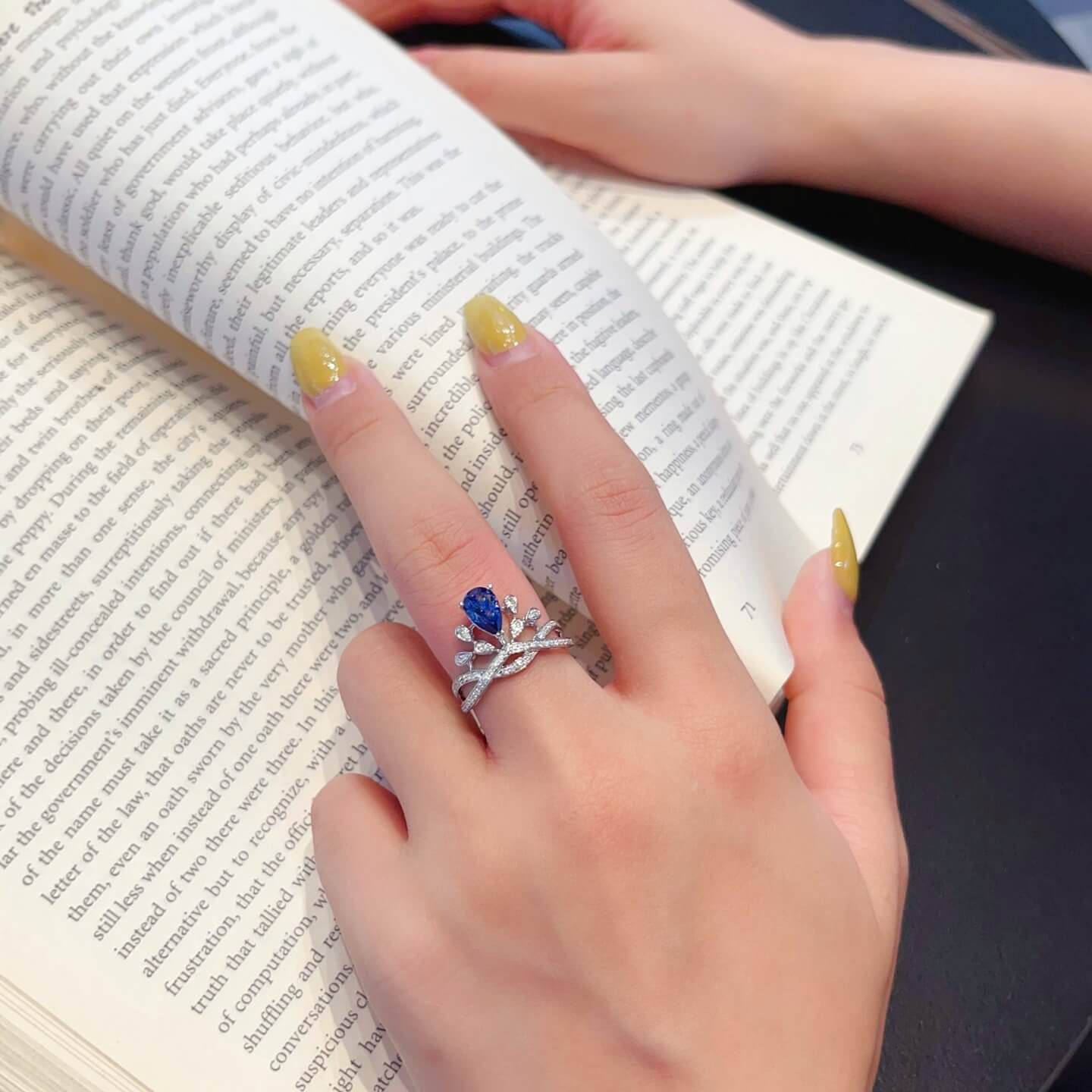 Halo setting pear cut  lab grown sapphire engagement ring