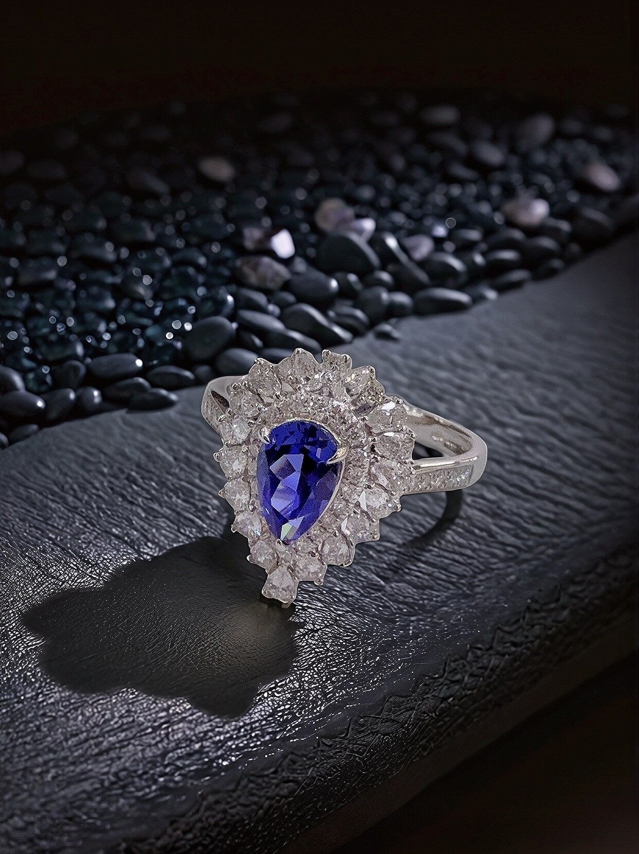 Halo setting pear cut  lab grown sapphire engagement ring