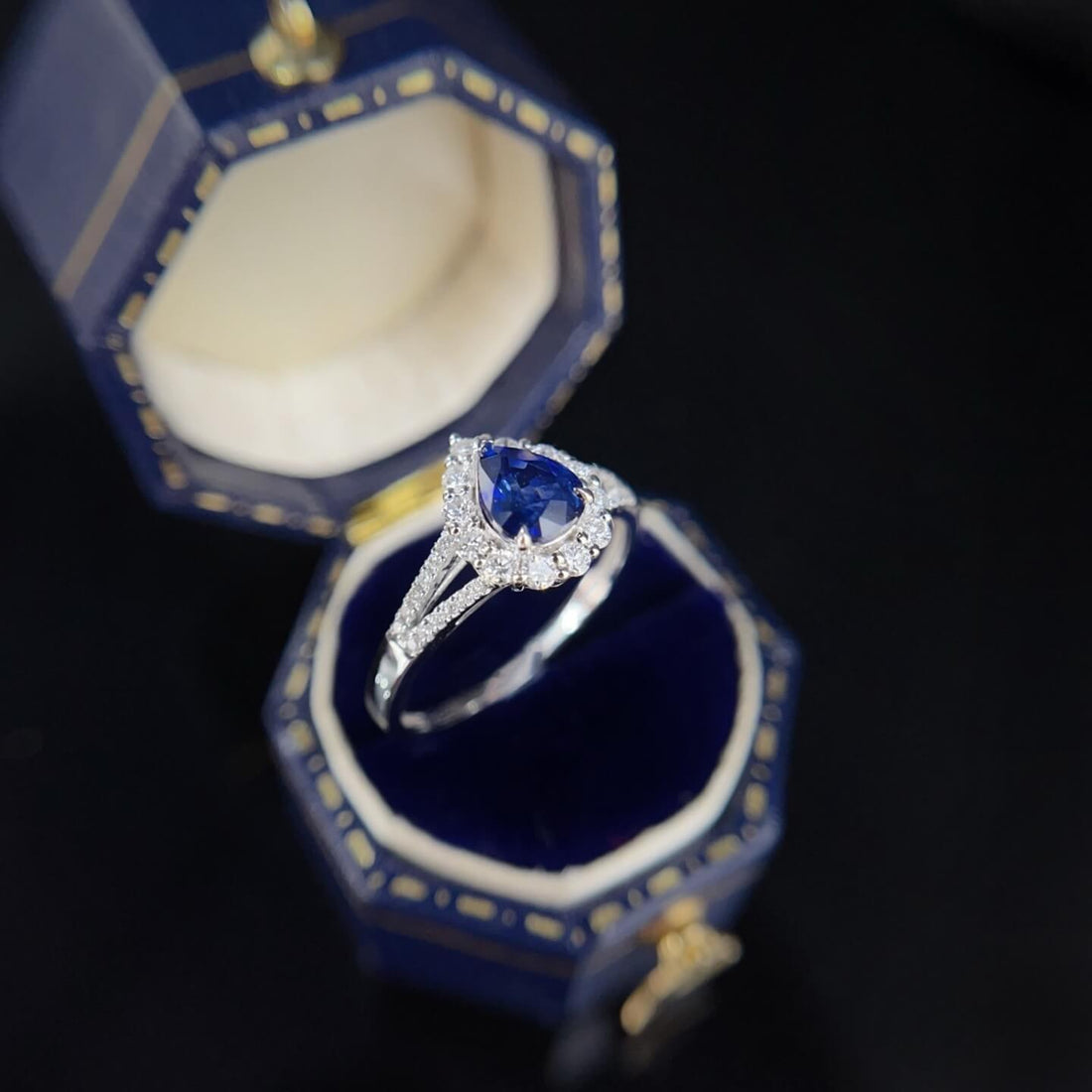 Halo setting pear cut  lab grown sapphire engagement ring