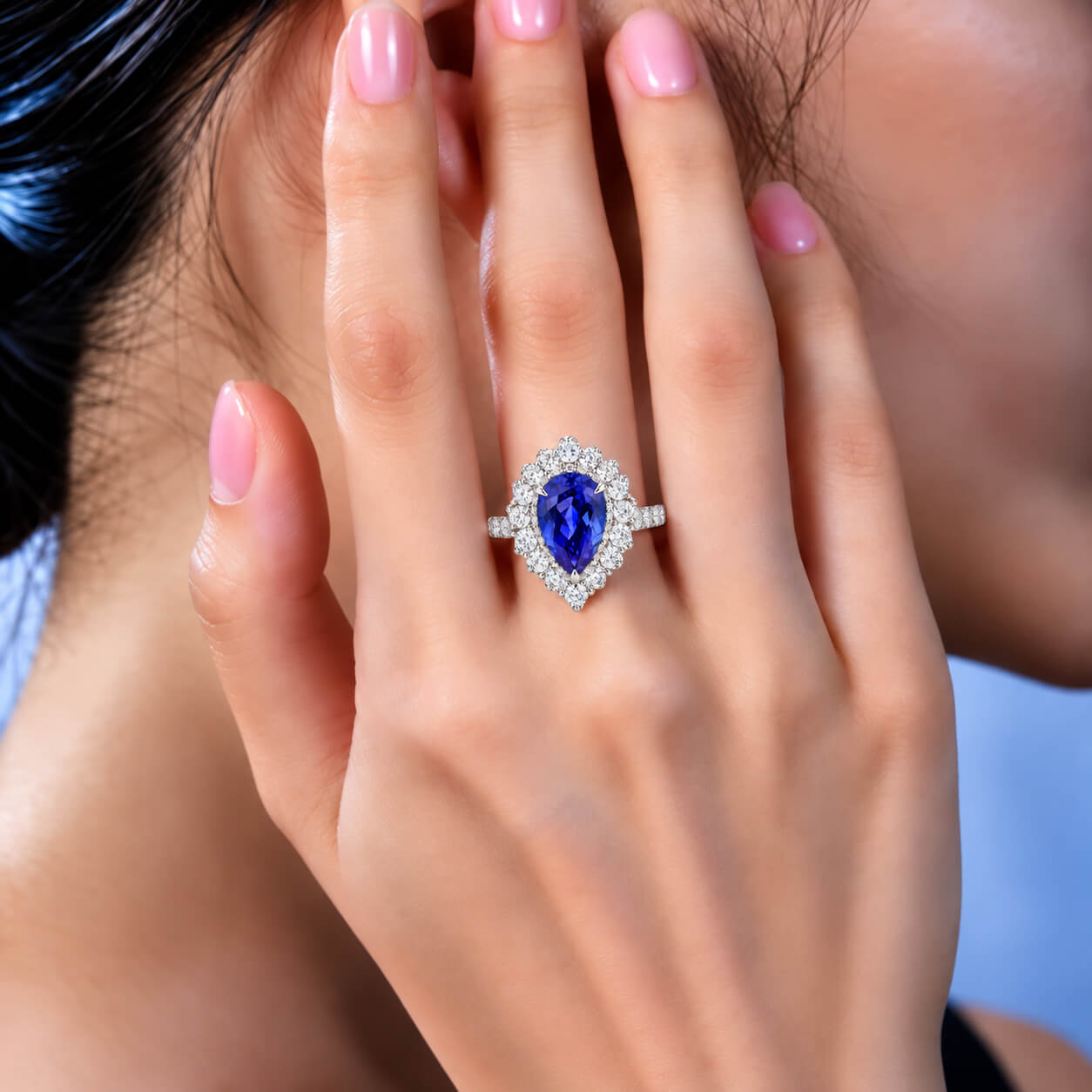Halo setting pear cut  lab grown sapphire engagement ring