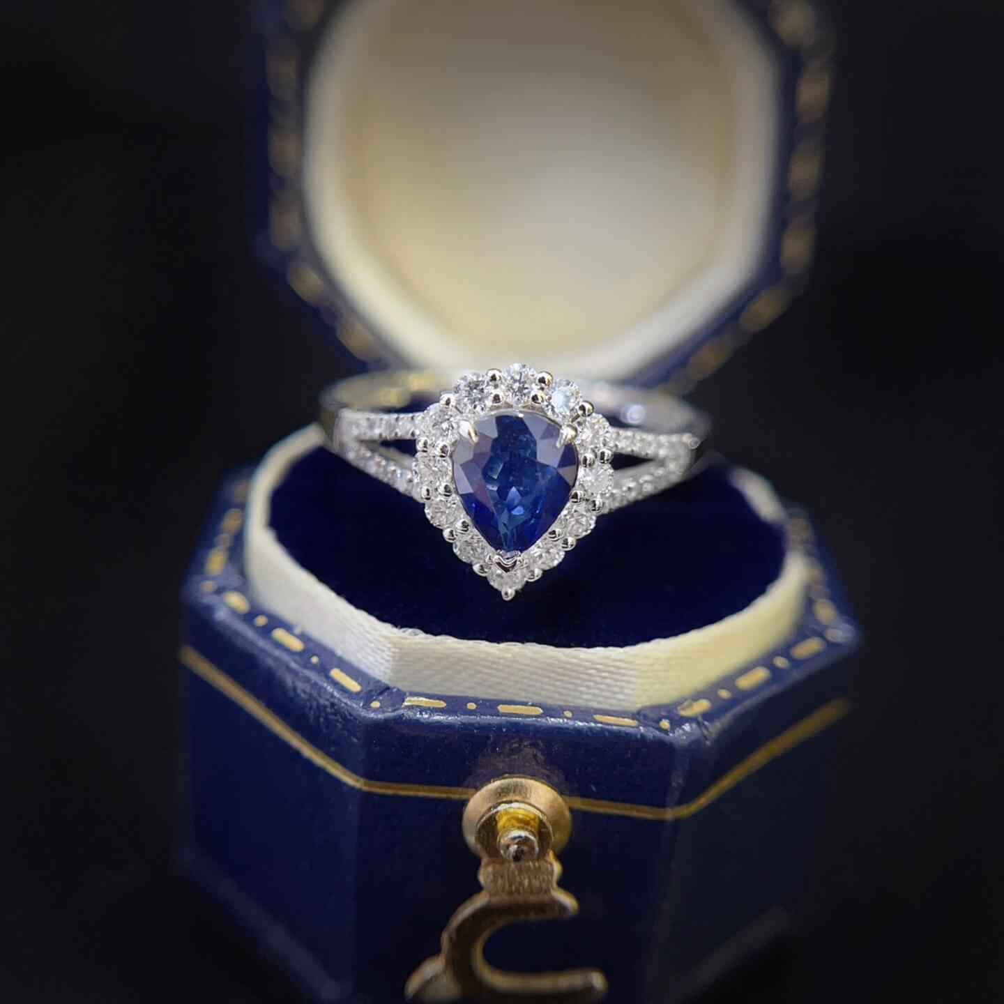 Halo setting pear cut  lab grown sapphire engagement ring