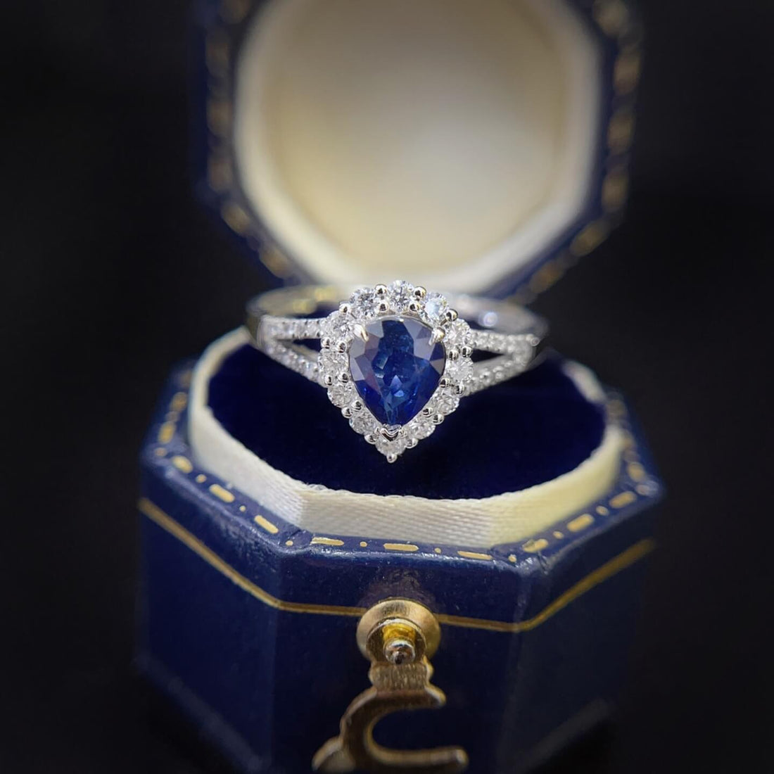Halo setting pear cut  lab grown sapphire engagement ring