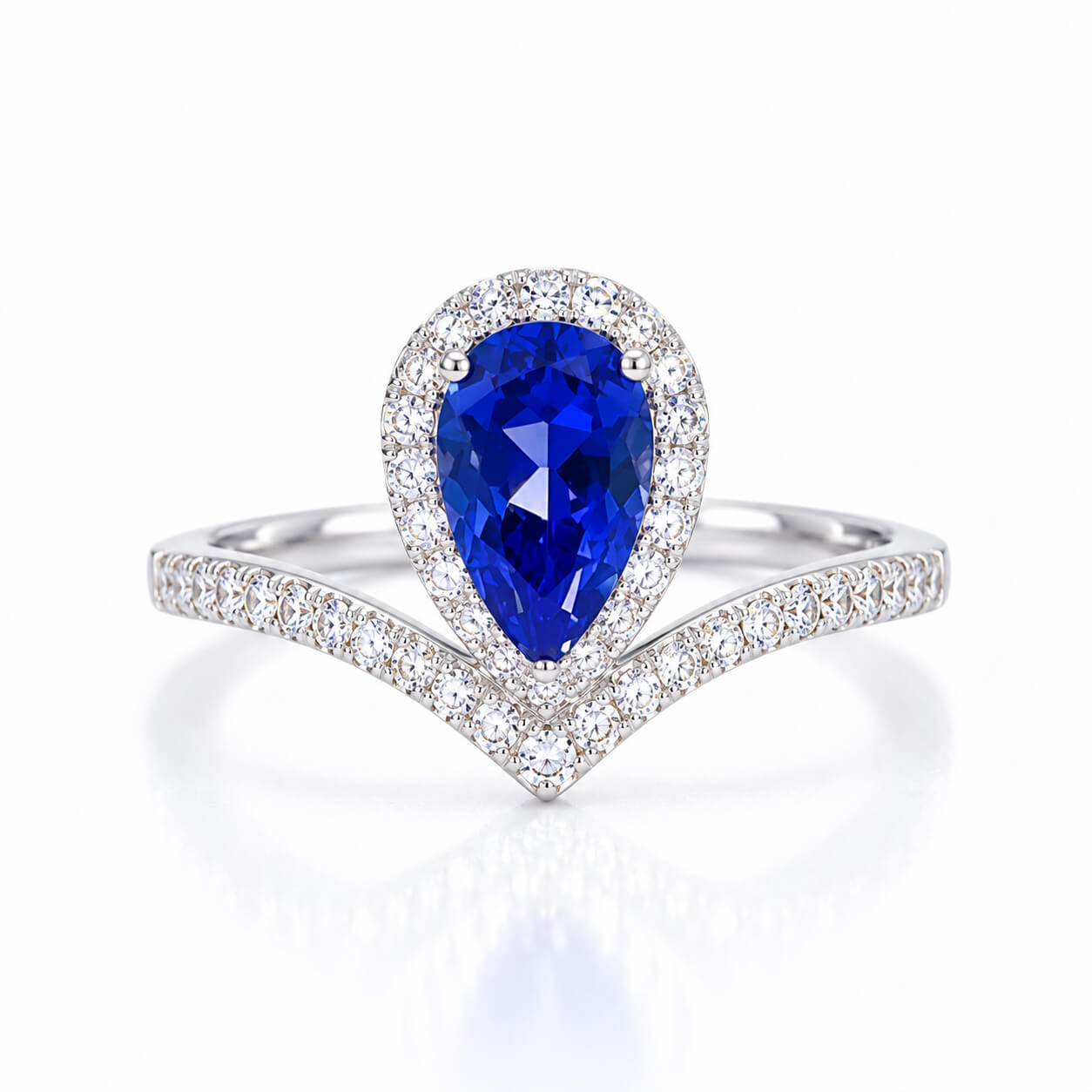 Halo setting pear cut  lab grown sapphire engagement ring
