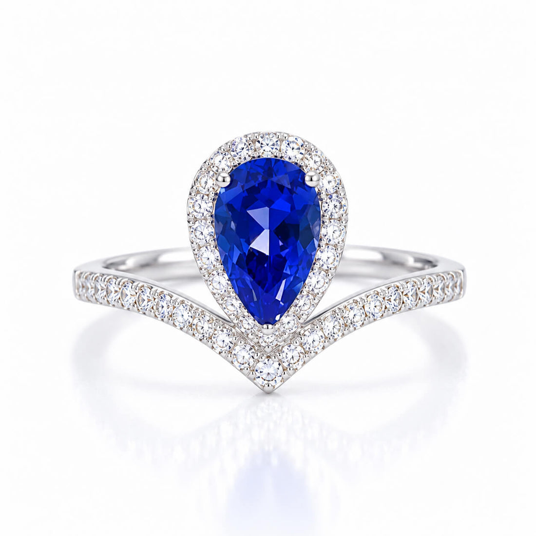Halo setting pear cut  lab grown sapphire engagement ring