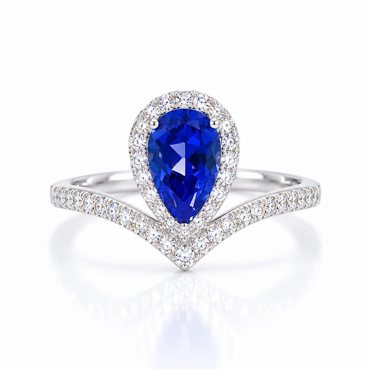 Halo setting pear cut  lab grown sapphire engagement ring
