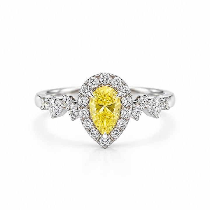 Halo setting pear cut lab grown yellow diamond engagement ring