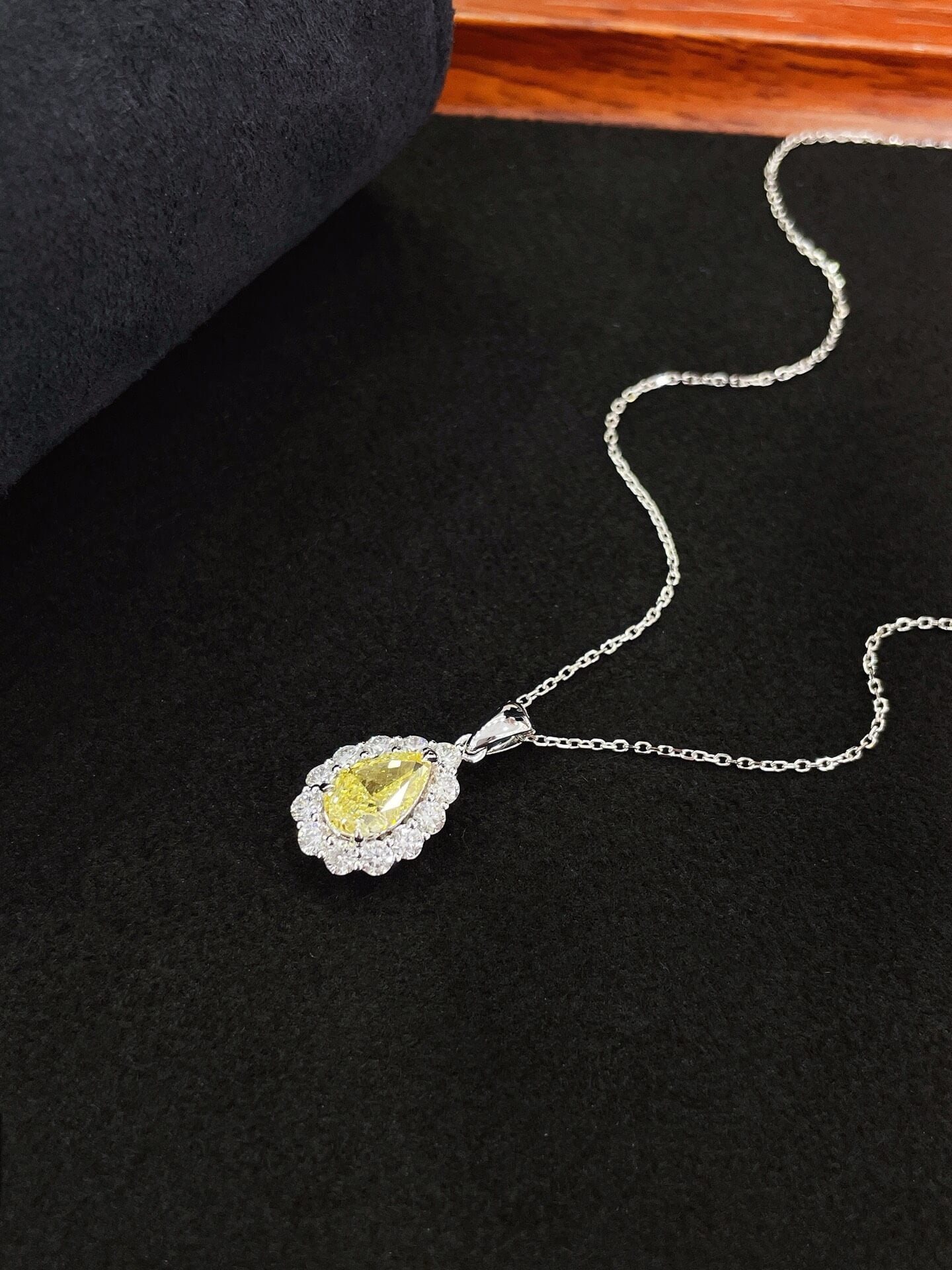 Halo setting pear cut lab grown yellow diamond pendant necklace