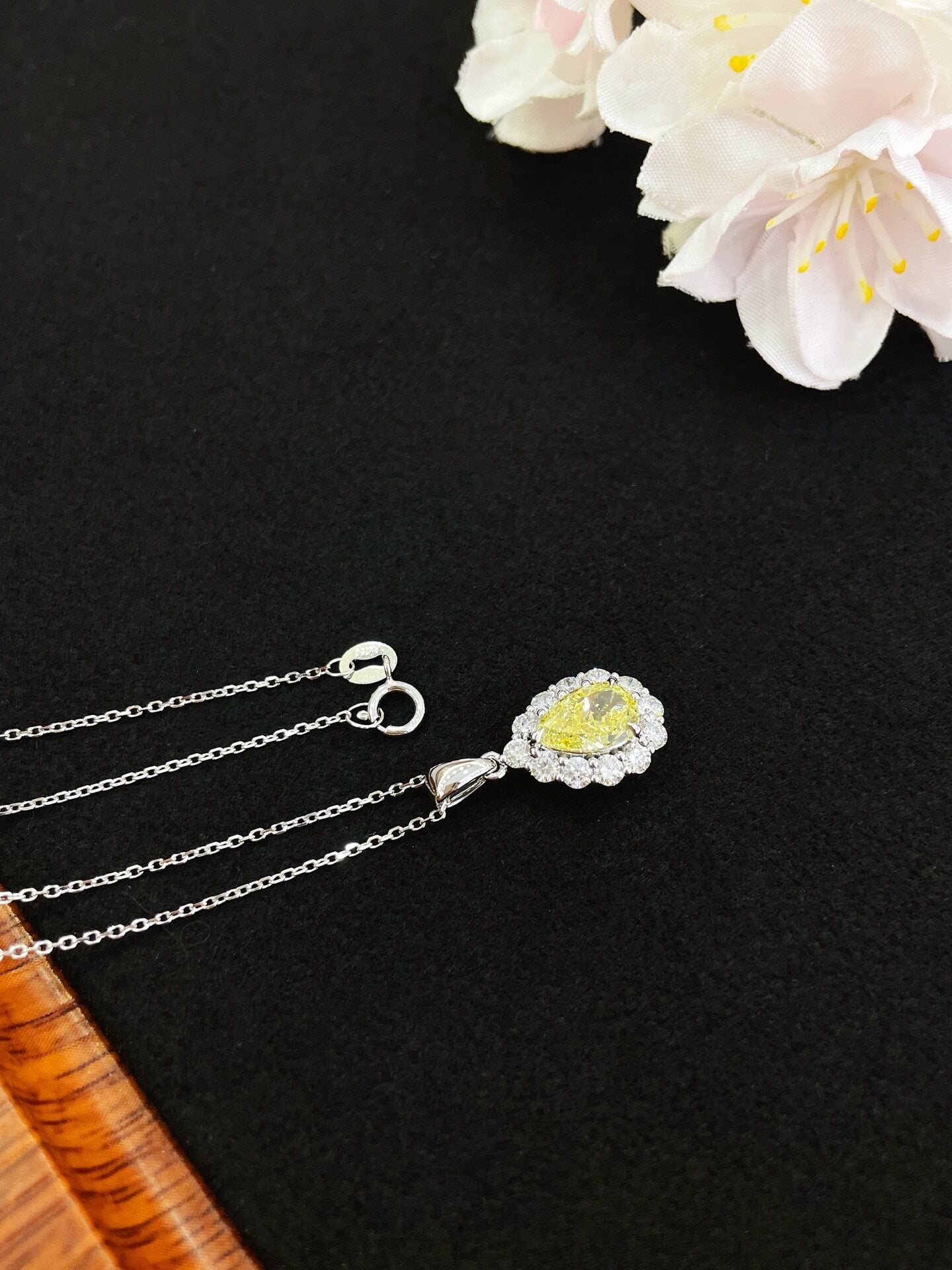 Halo setting pear cut lab grown yellow diamond pendant necklace