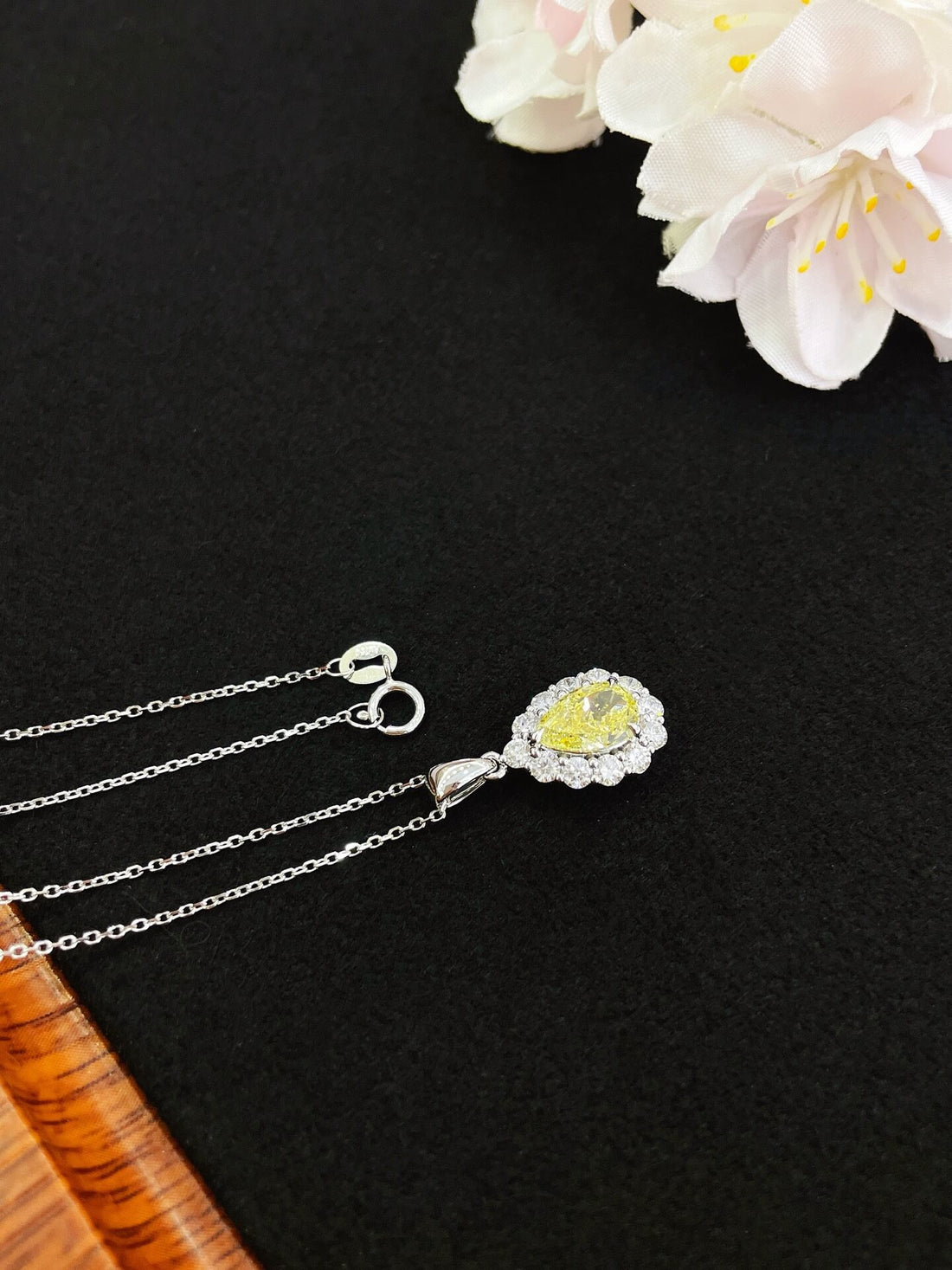 Halo setting pear cut lab grown yellow diamond pendant necklace