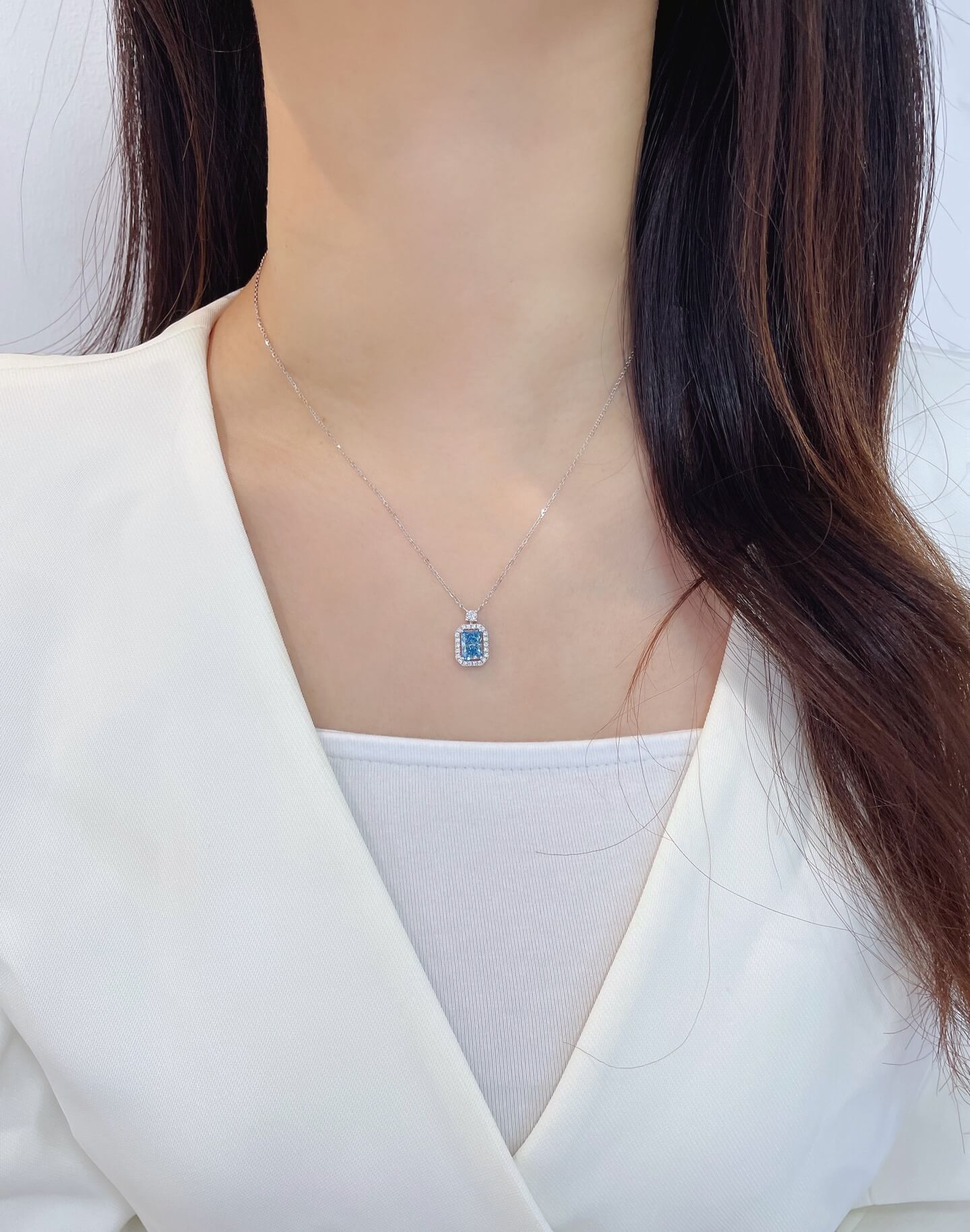 Halo setting radiant cut lab grown blue diamond necklace