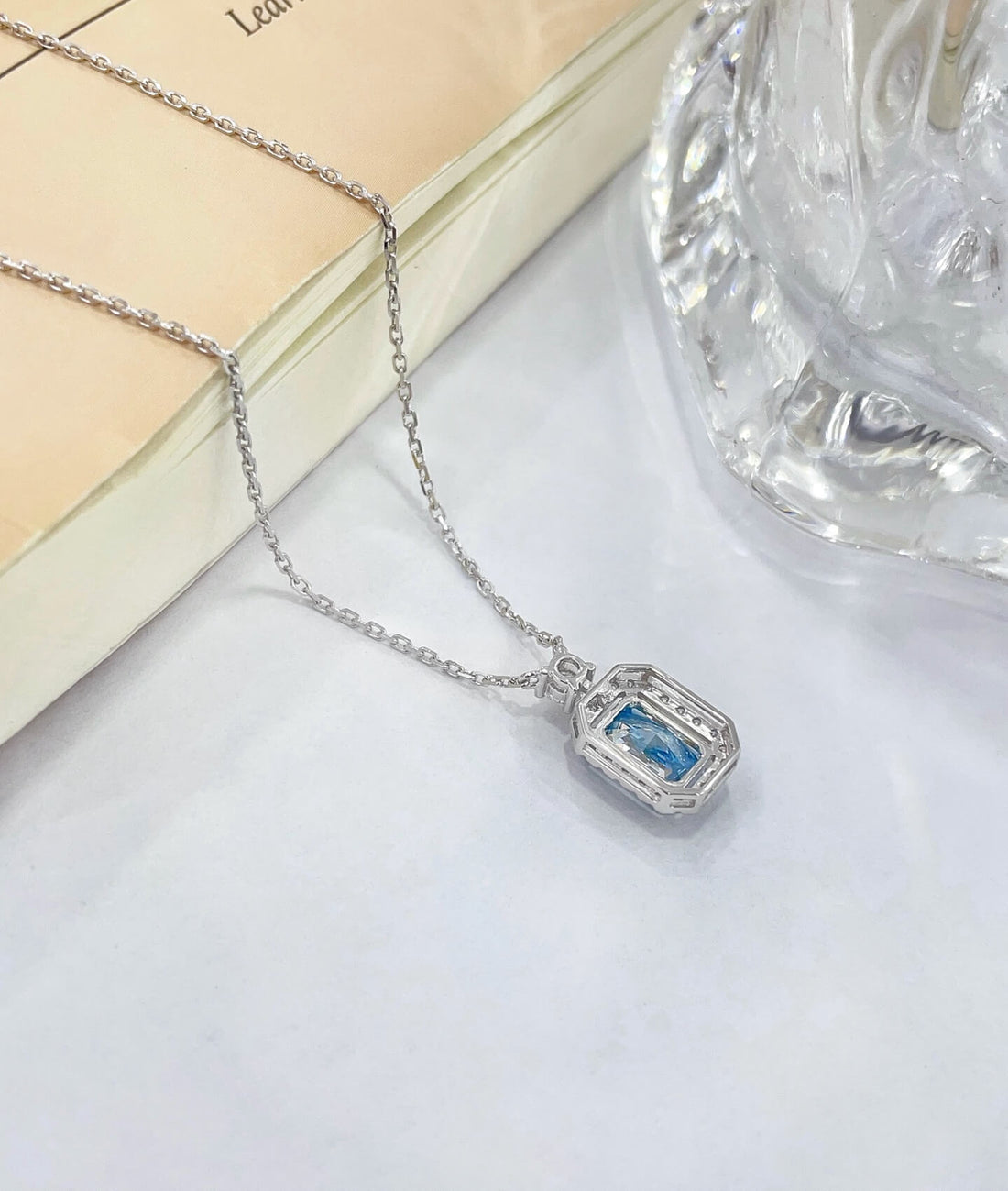 Halo setting radiant cut lab grown blue diamond necklace