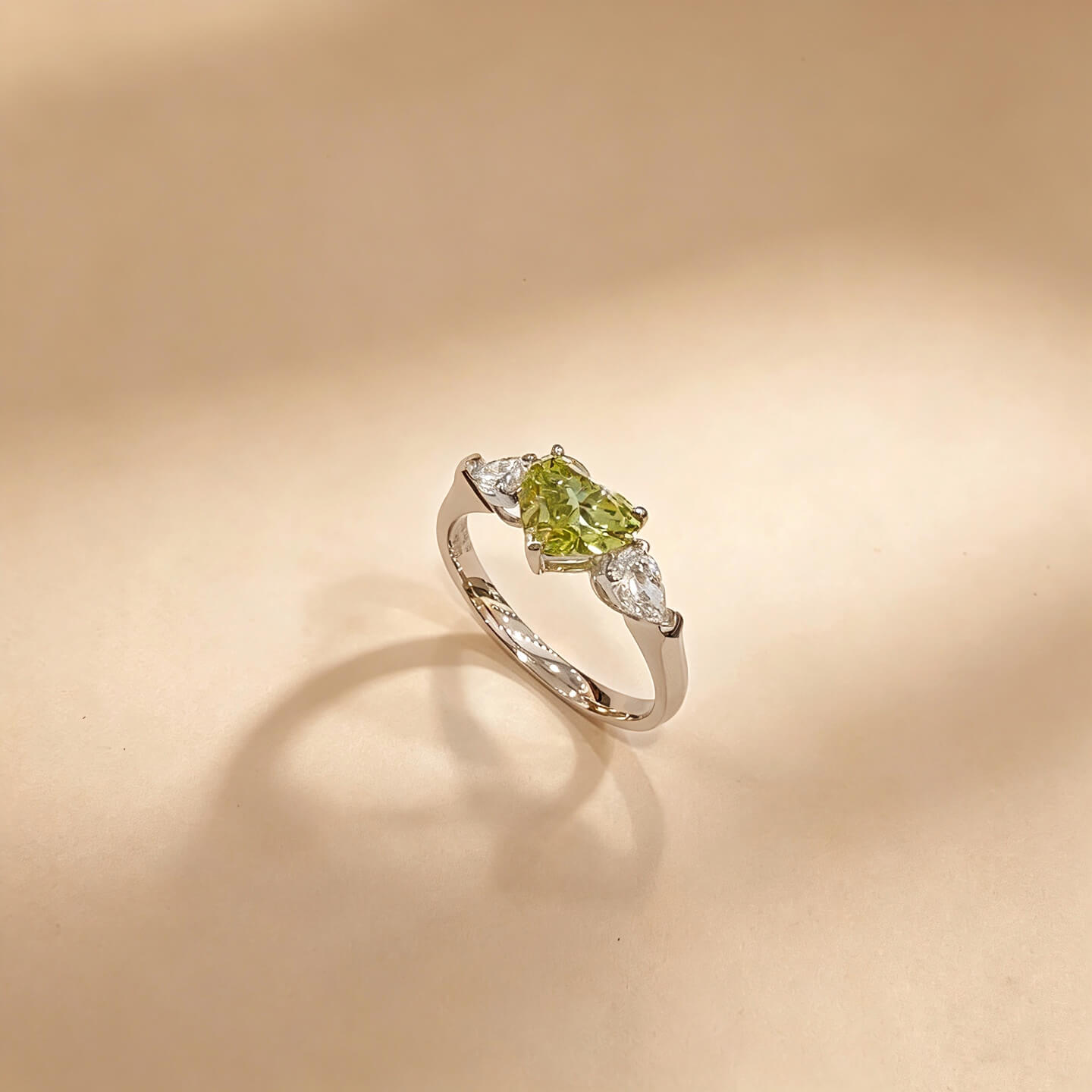 Heart cut lab grown green diamond three stones engagement ring