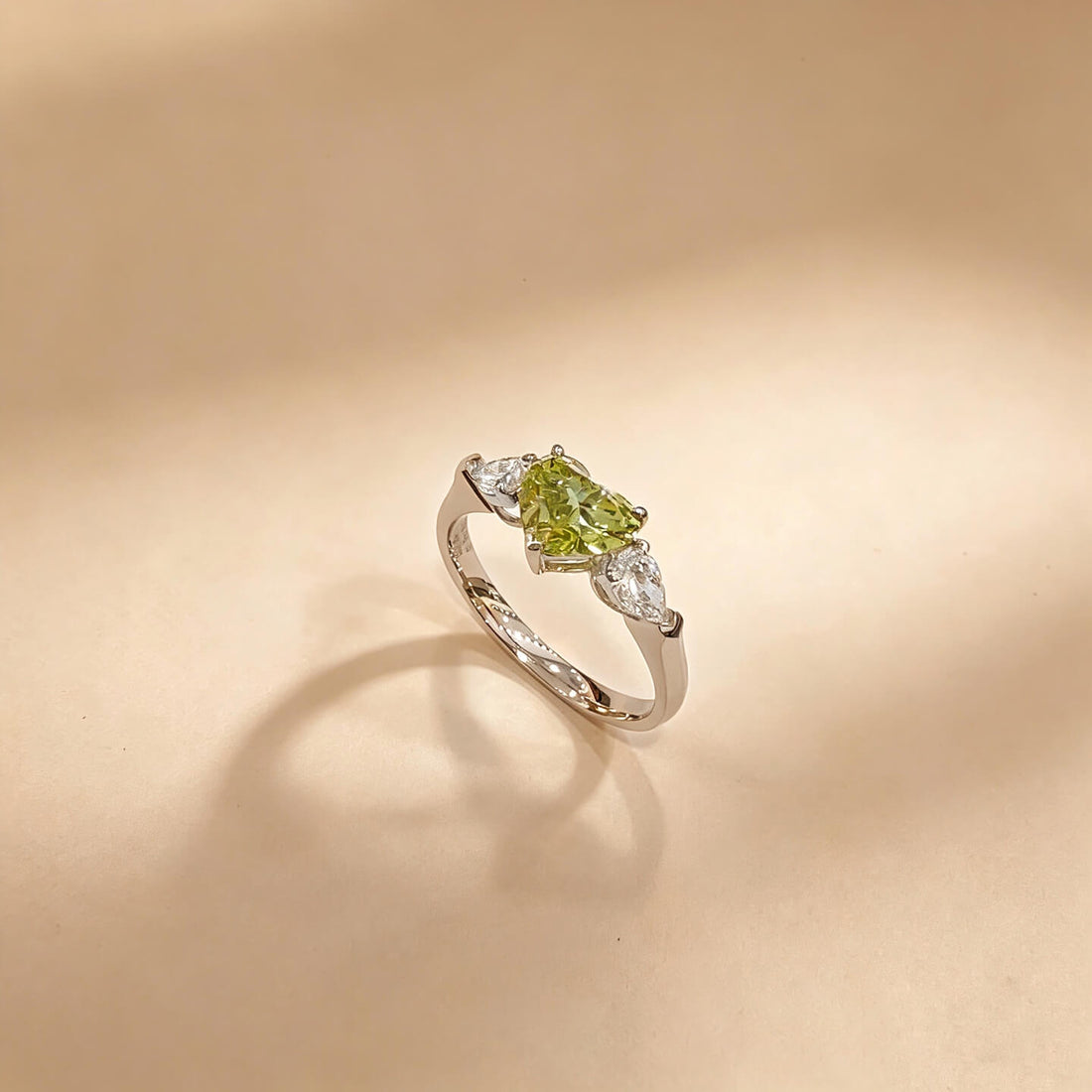 Heart cut lab grown green diamond three stones engagement ring
