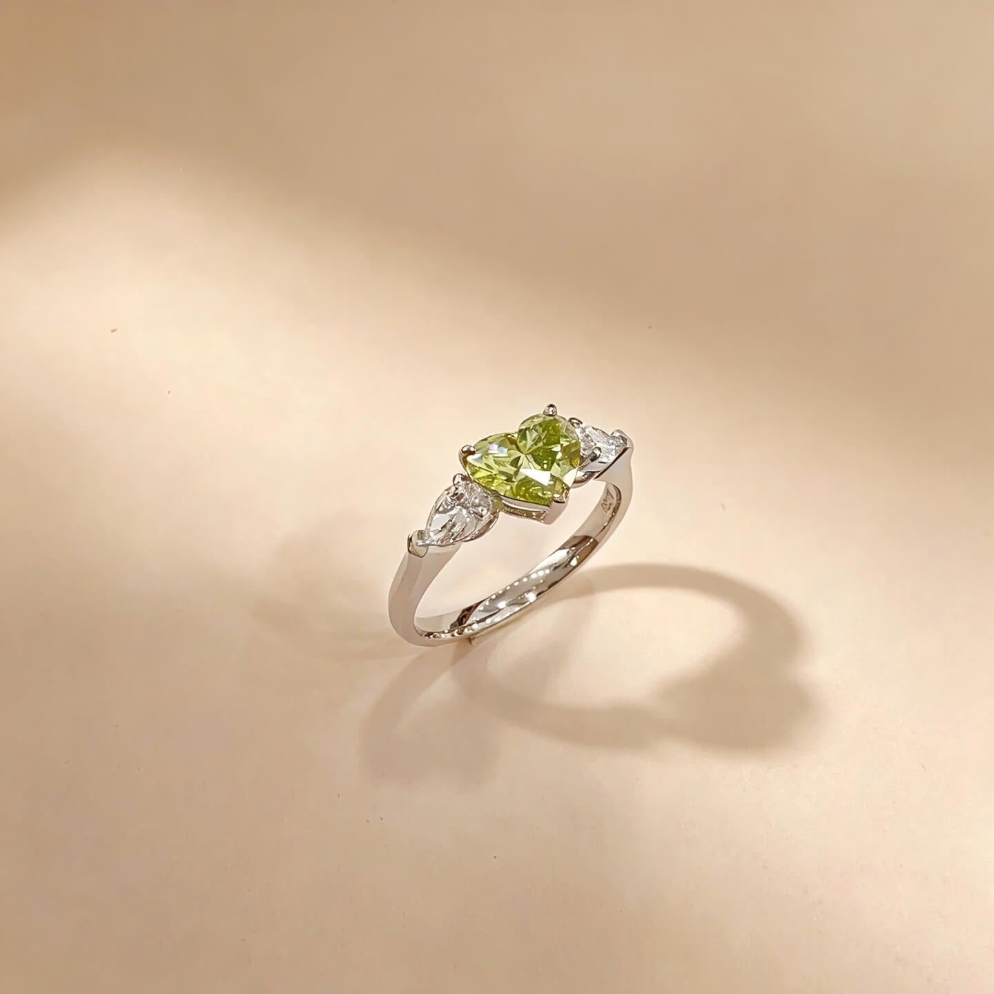 Heart cut lab grown green diamond three stones engagement ring