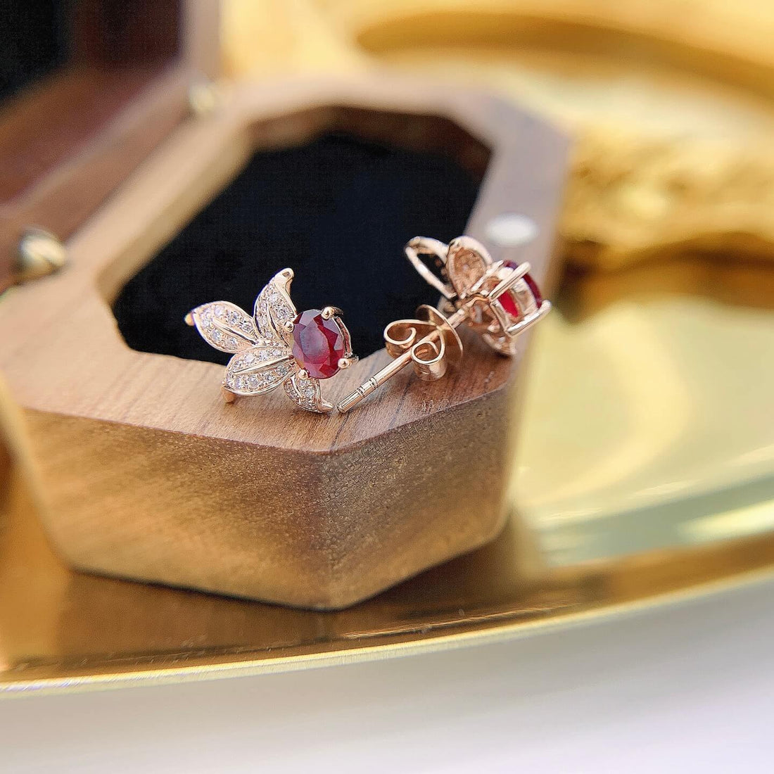 Leaves design oval cut lab grown ruby earrings stud
