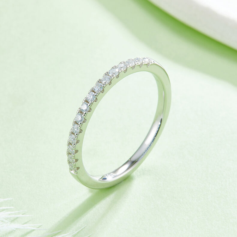 Half pave round cut Moissanite wedding band