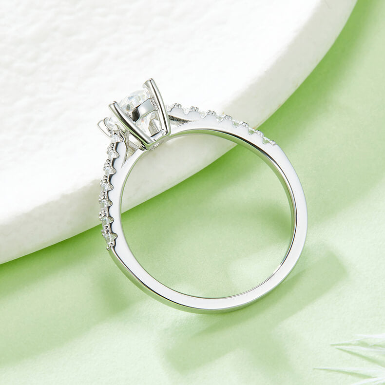 Half pave oval cut Moissanite solitaire engagement ring