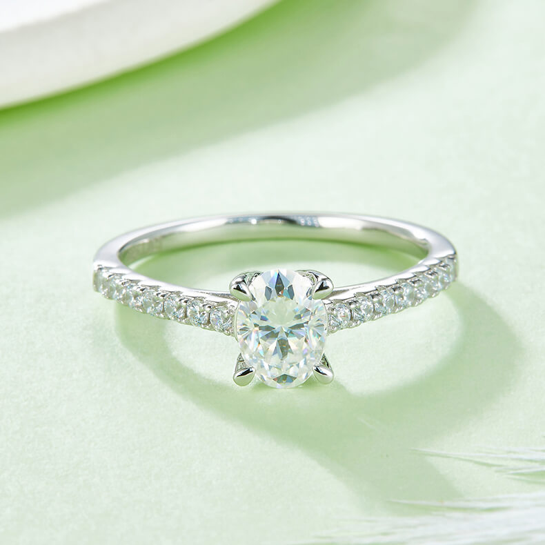 Half pave oval cut Moissanite solitaire engagement ring
