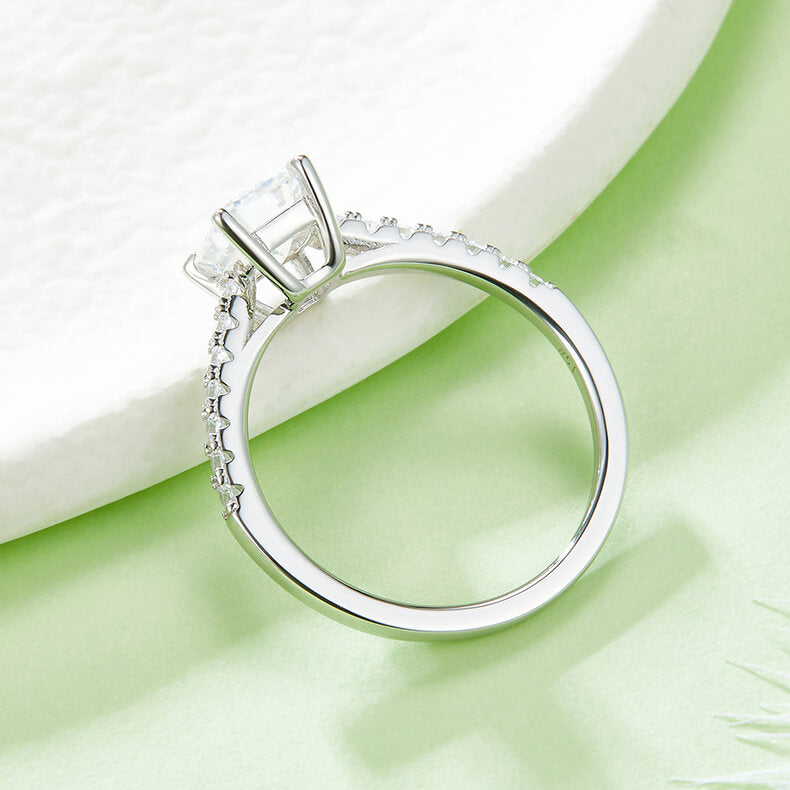 Half pave emerald cut Moissanite solitaire engagement ring
